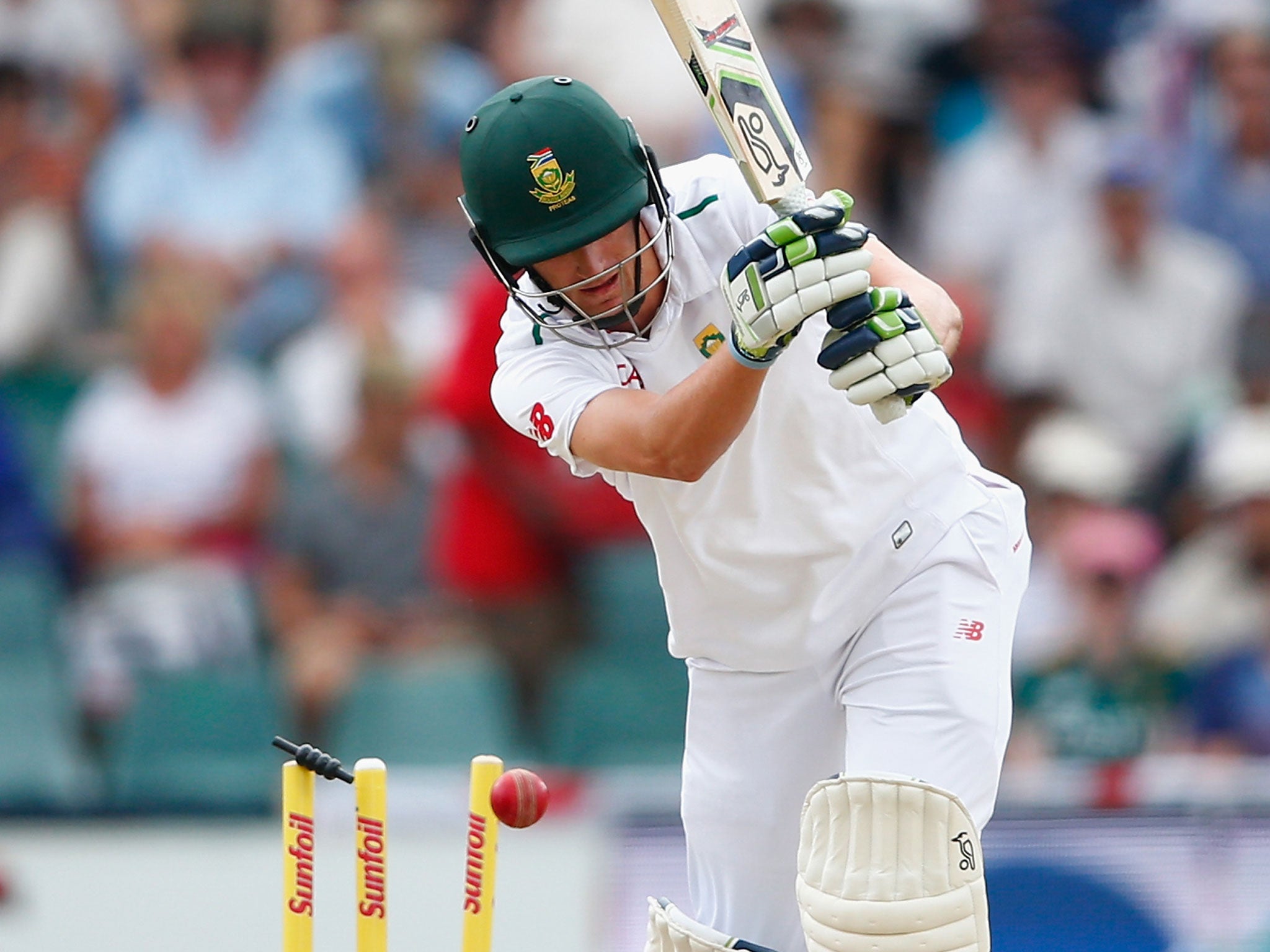 Chris Morris of South Africa is clean bowled by Ben Stokes