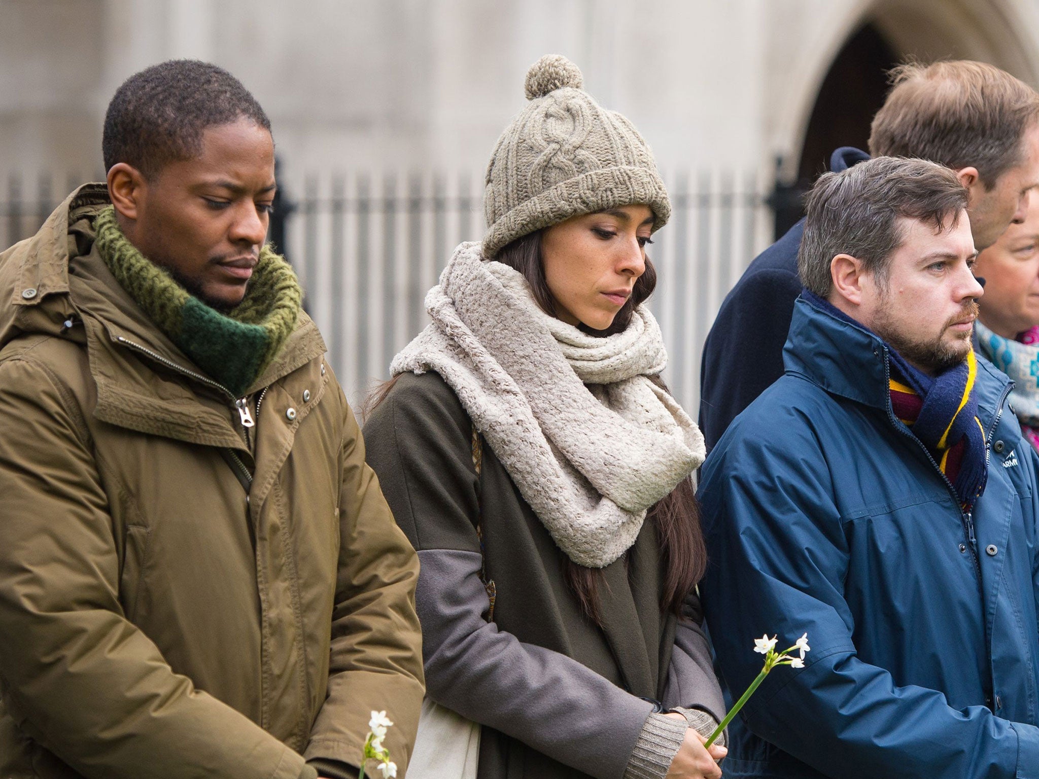 Adetomiwa Edun and Oona Chaplin at a memorial service organised by Citizens UK for refugees who have died trying to reach the UK, at St Andrew's Church in the City of London.