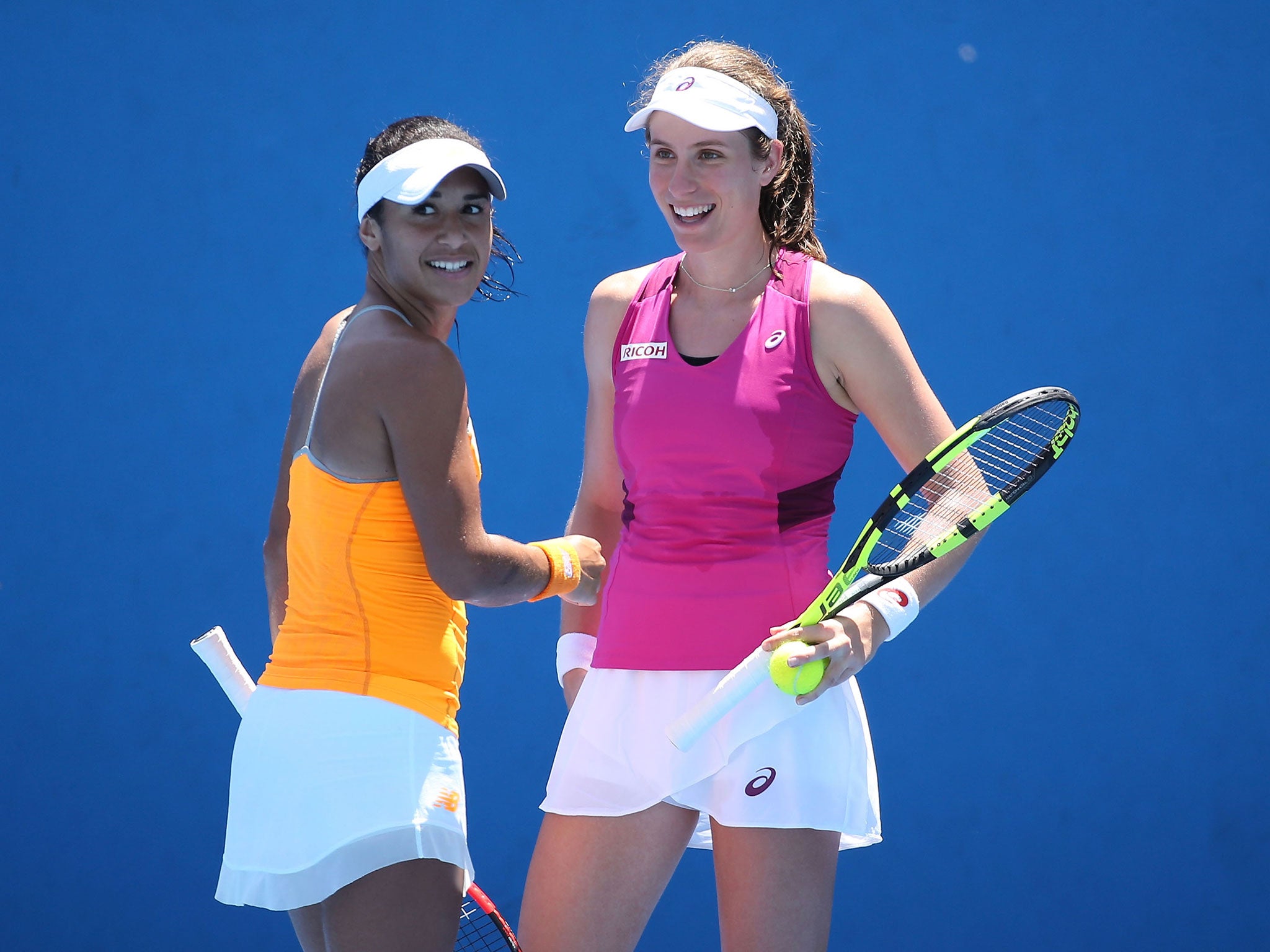 Heather Watson (left) and Johanna Konta will face fellow British pair Jocelyn Rae and Anna Smith