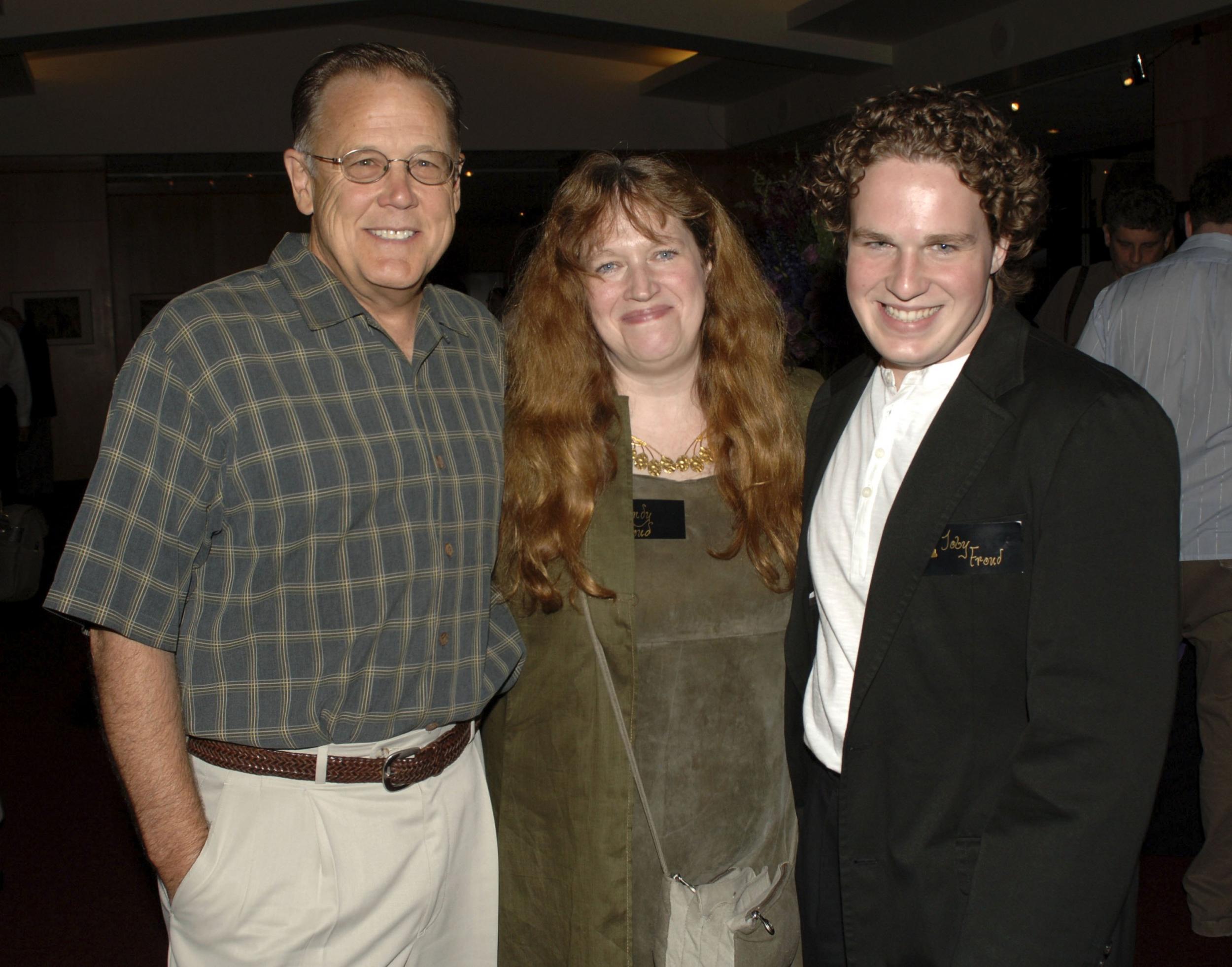 Toby Froud (far right) is now 31