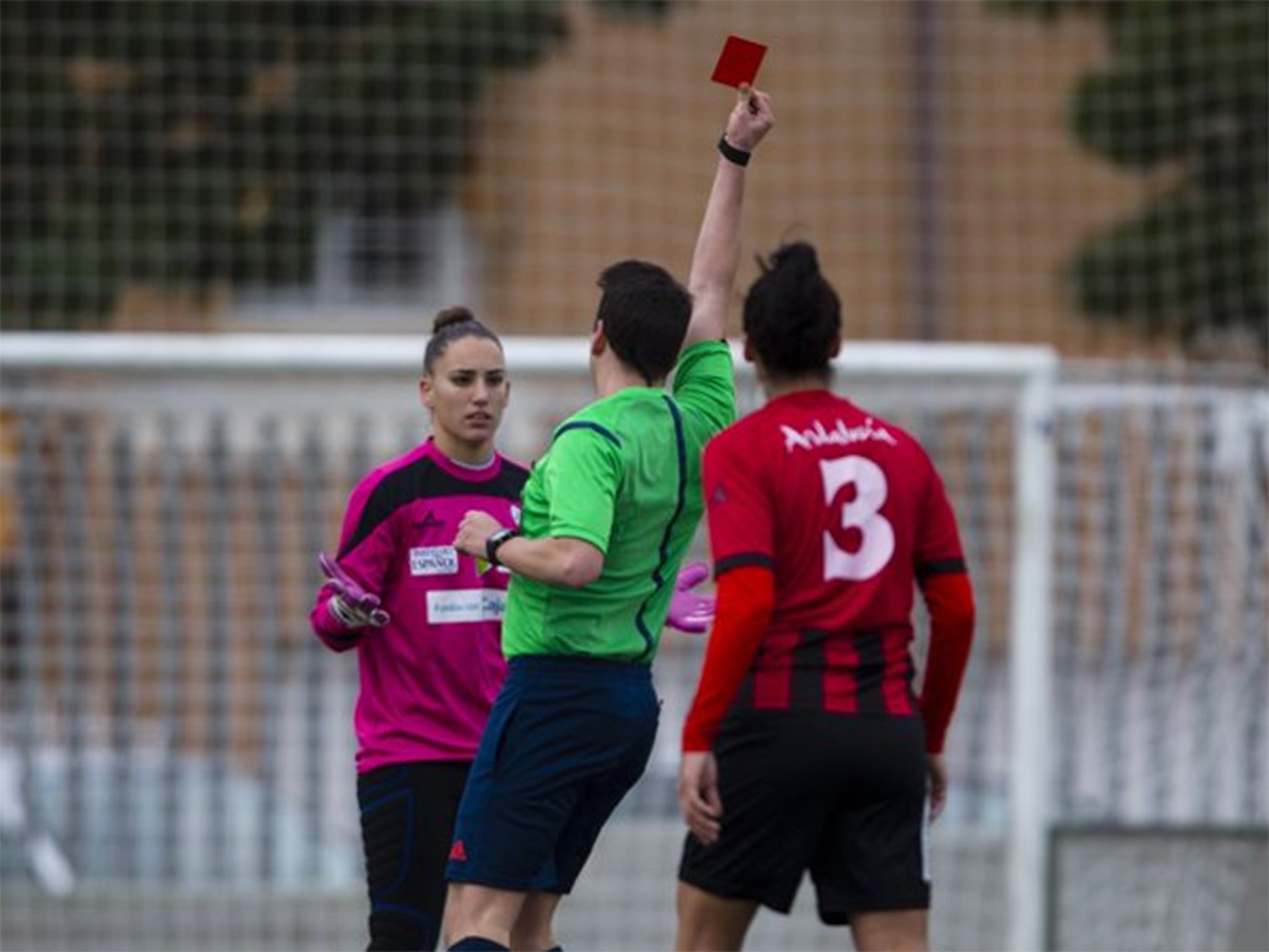 Santiago Quijada Alcon sends off a Sporting Huelva player