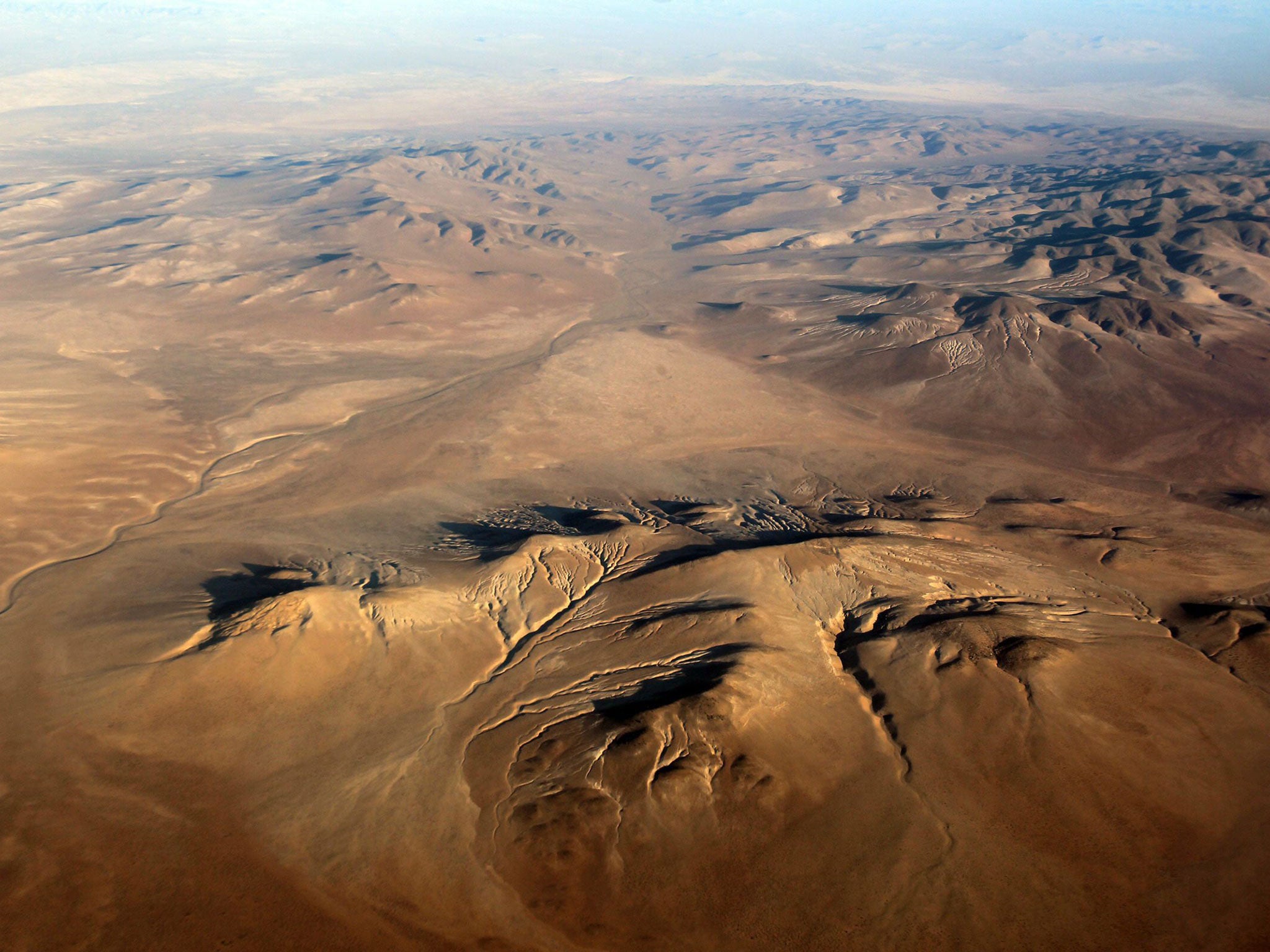 The Atacama desert is the driest place on Earth. Its soil, which lacks basic nutrients and is devoid of organic matter, will be used to grow the trial tubers