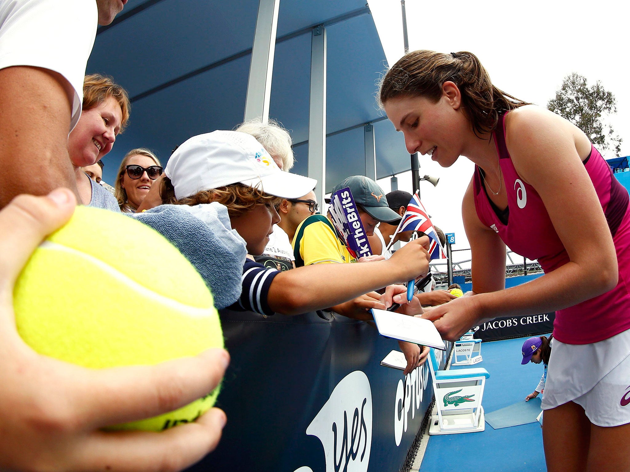 Johanna Konta signs autographs after her secondround victory over Zheng Saisai