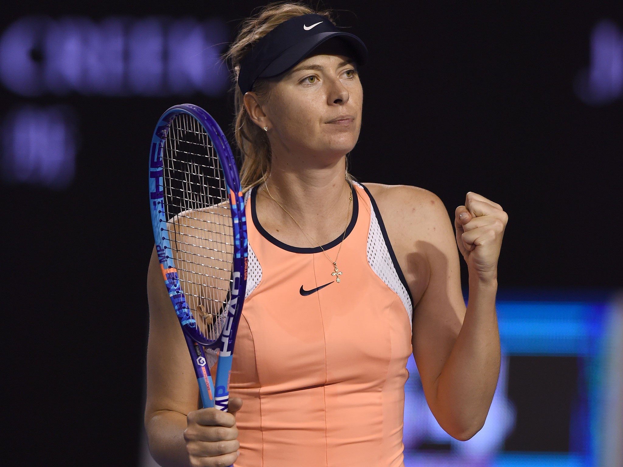 Maria Sharapova celebrates her third round victory over Lauren Davis