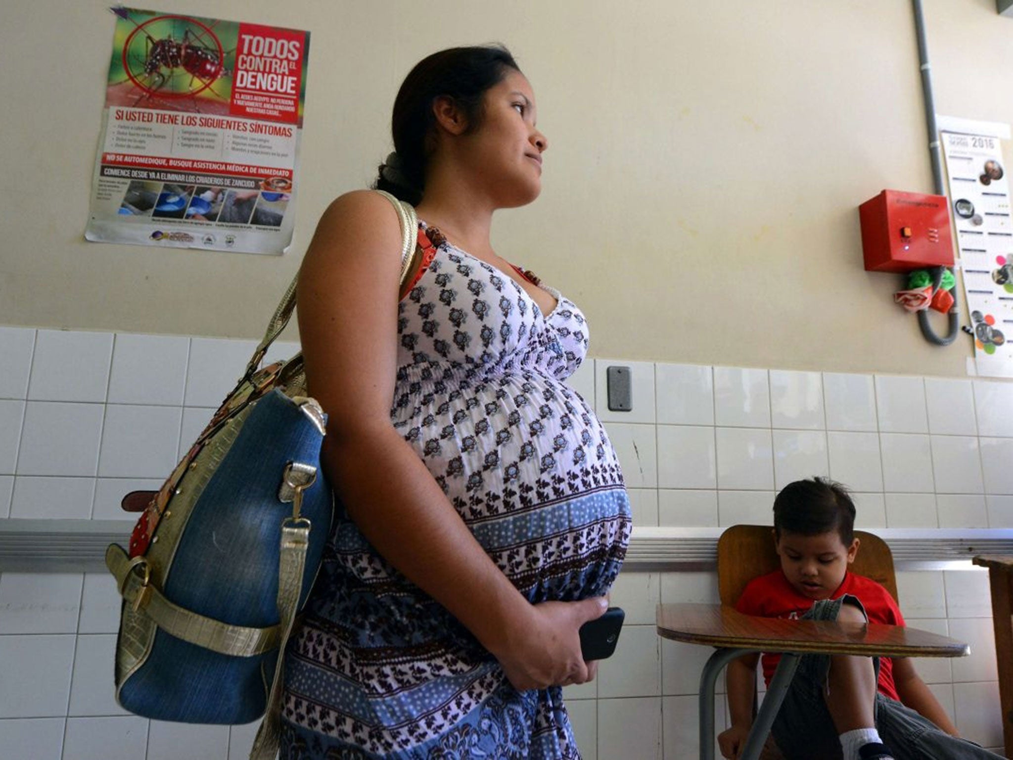 A pregnant woman waits to be see if she has Zika at a hospital in Honduras