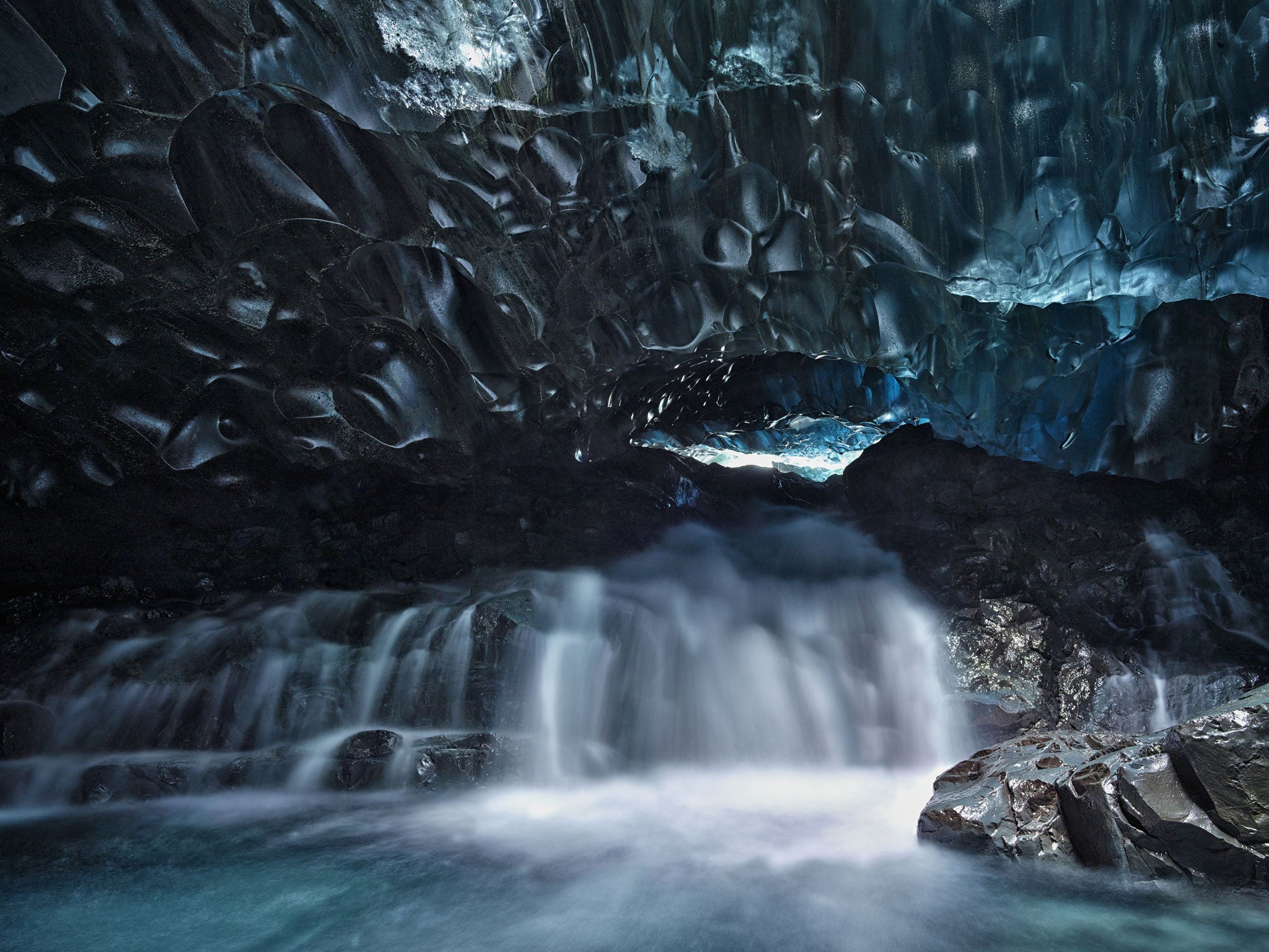 ‘Open’: Hearing about the translucent, Icelandic glaciers, ever-changing and marbled by lava, the art-photographer began what would become an annual pilgrimage