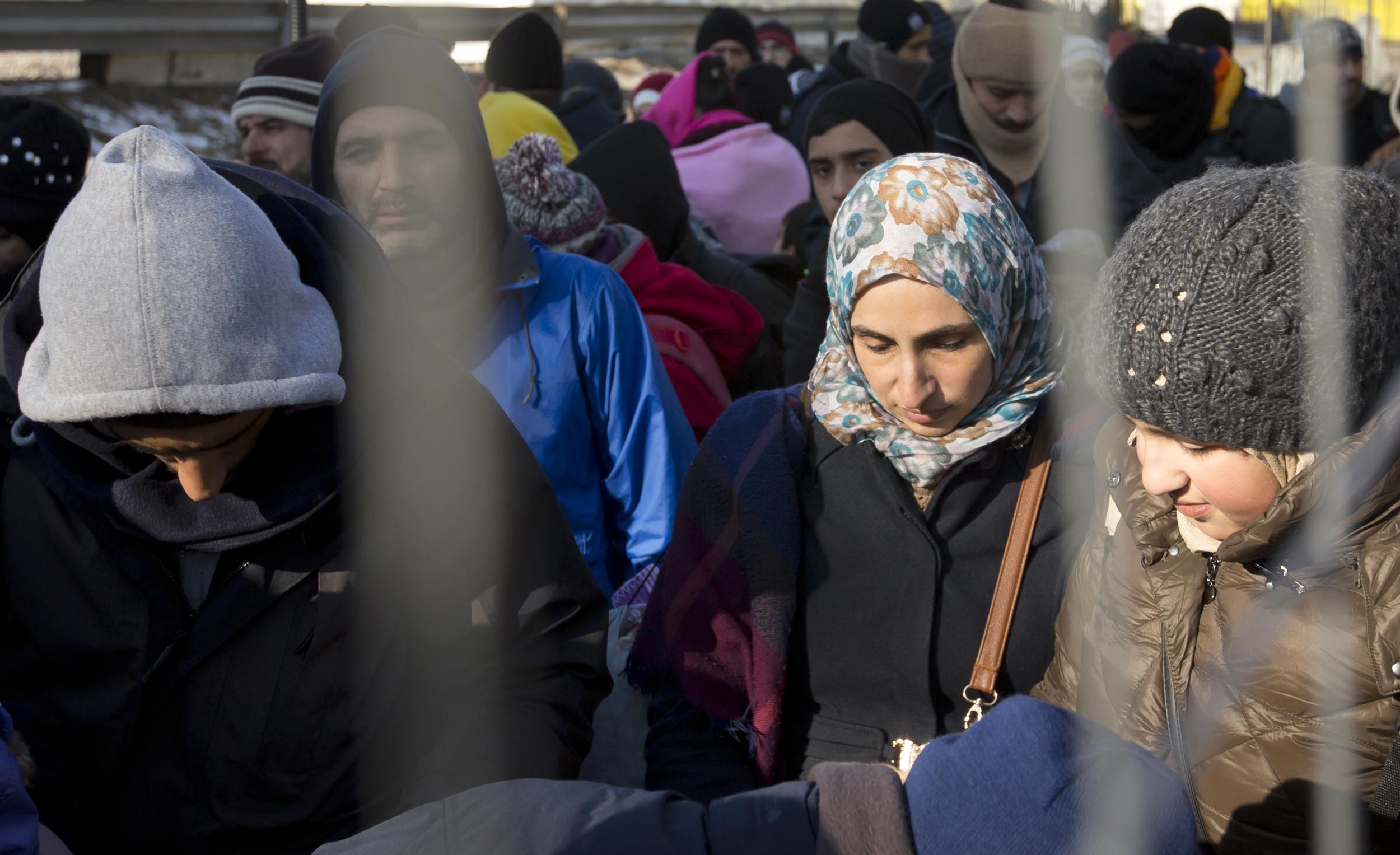 Thousands of migrants waited to be allowed to cross the border from Slovenia, in Spielfeld, Austria