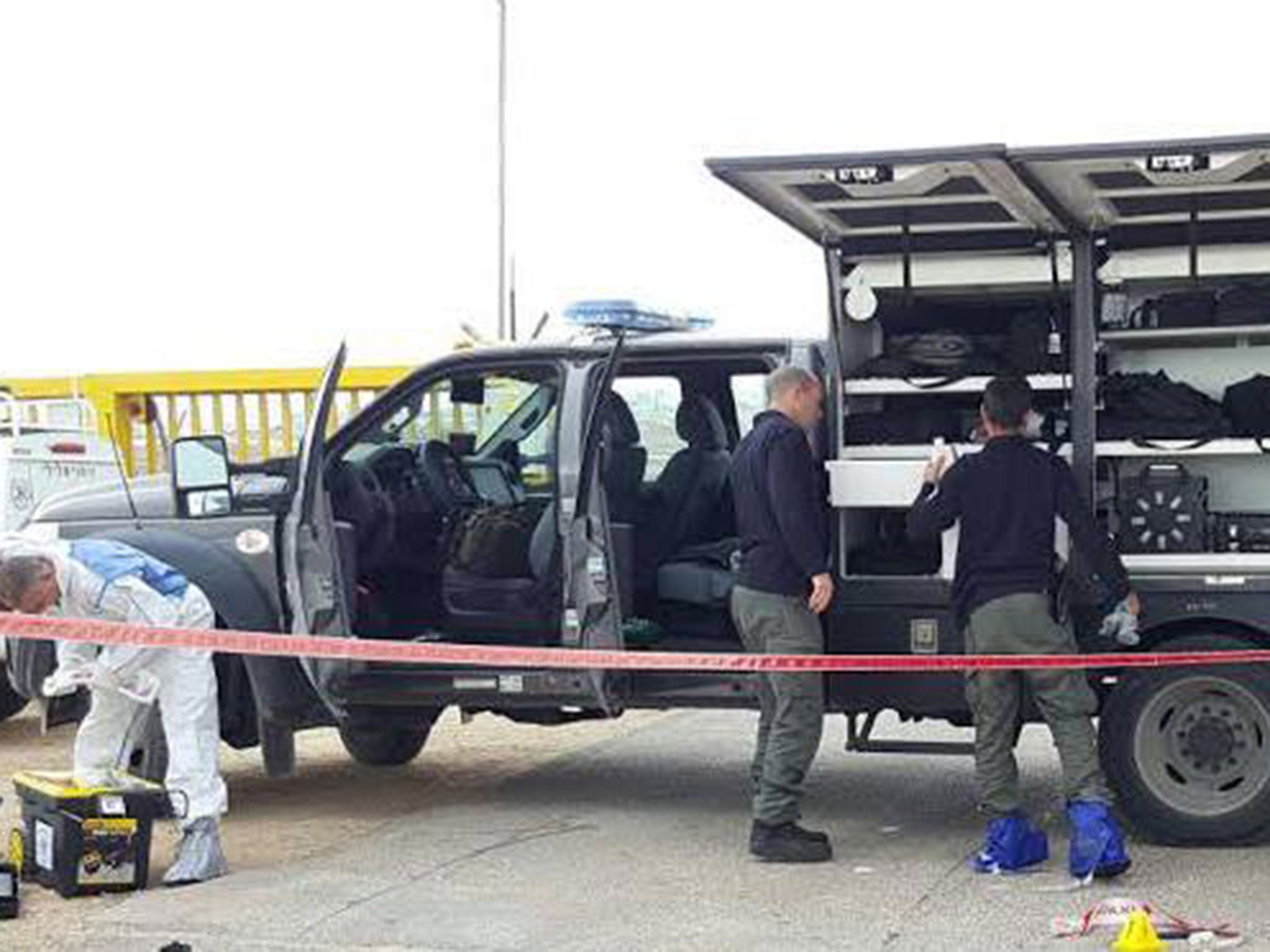 A knife (bottom right) could be seen in police photos from the scene at the Anatot settlement in the West Bank on 23 January 2016