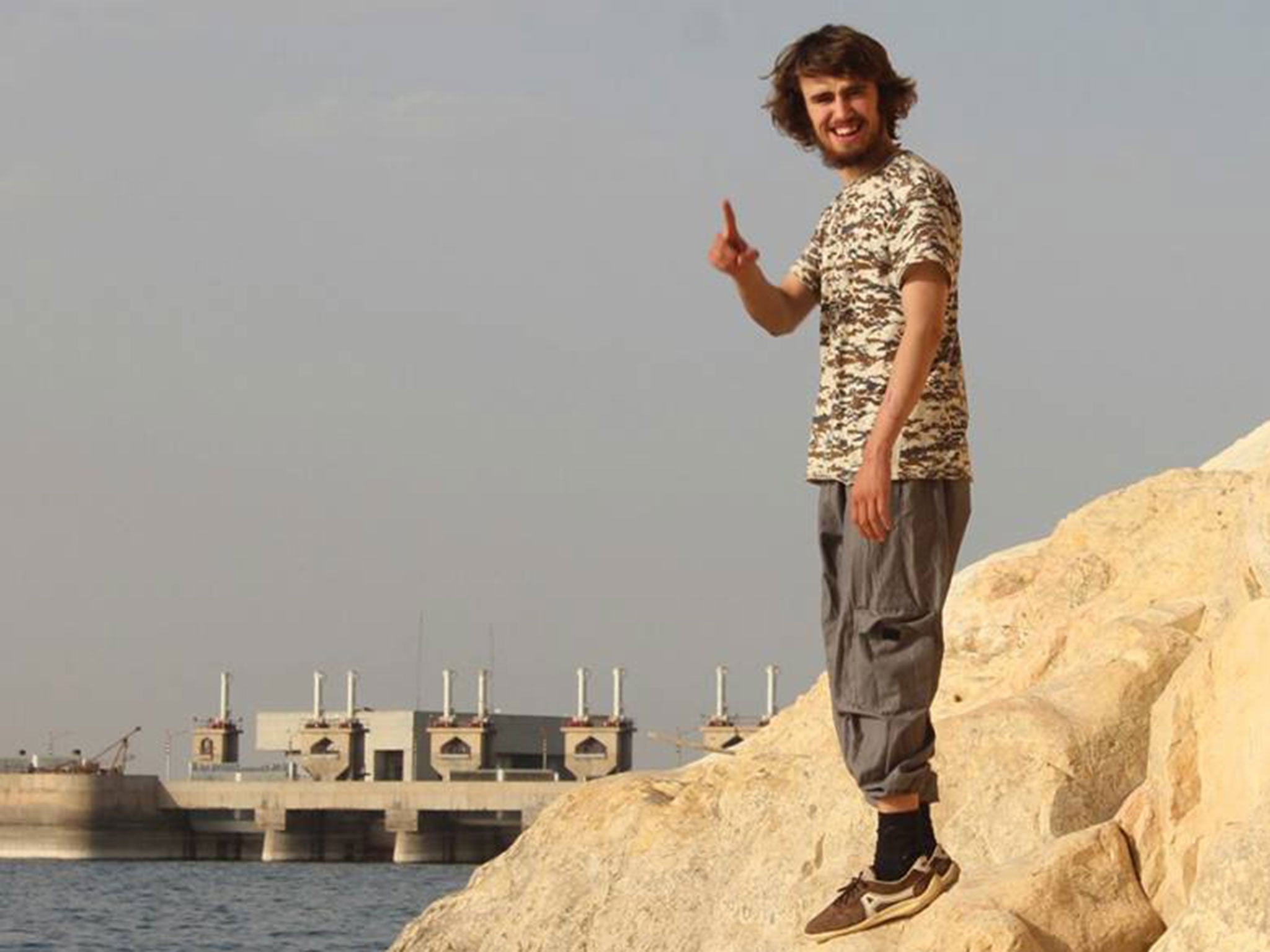 &#13;
British jihadi Jack Letts, in a picture he posted on Facebook in May 2015 near the Tabqa Dam in Syria &#13;