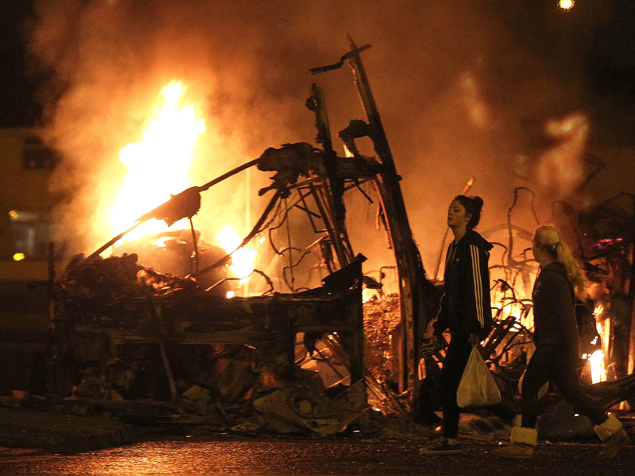 A burning bus in north Belfast, set on fire during a loyalist demonstration on January 2013