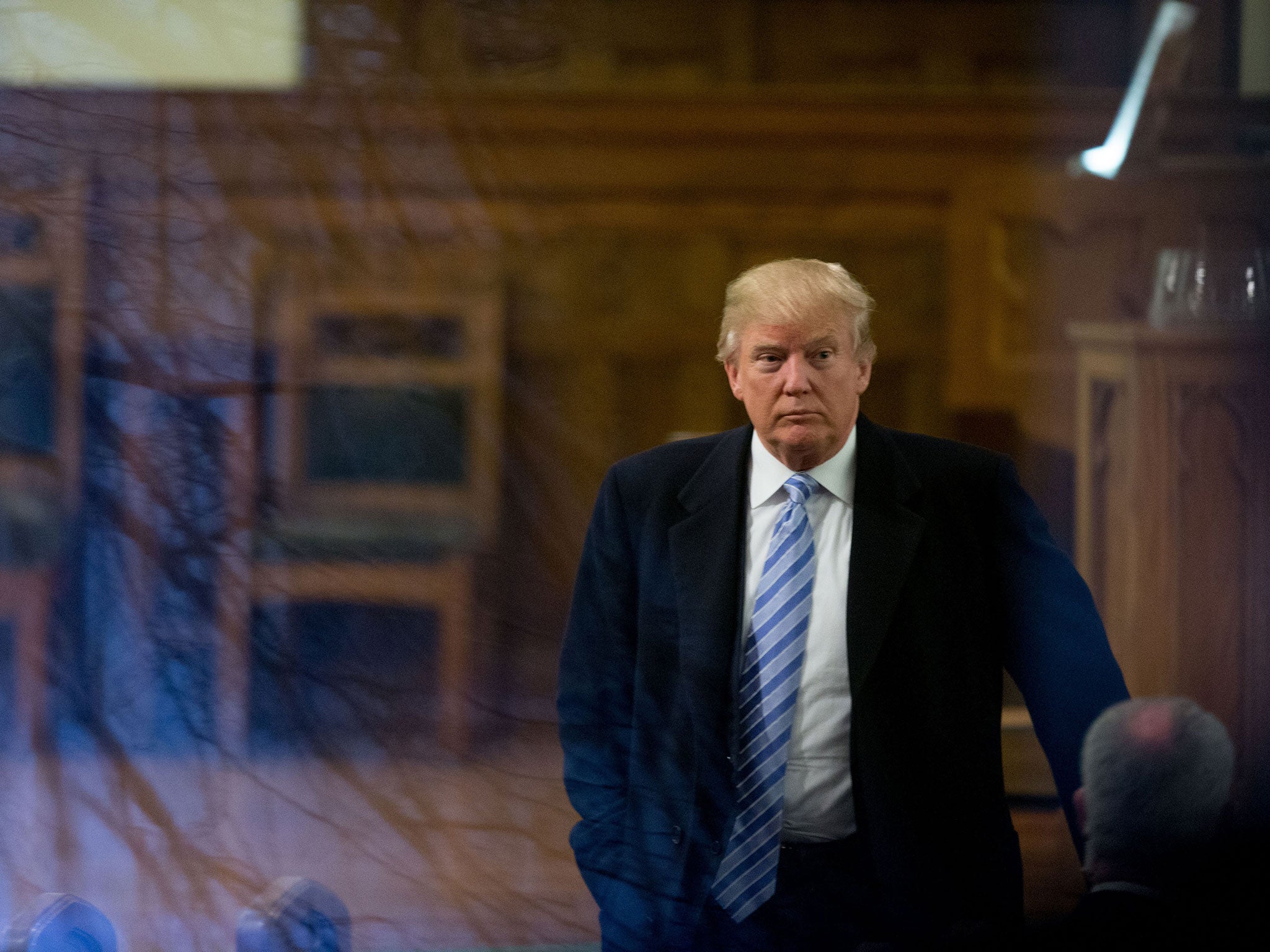 Republican presidential candidate Donald Trump arrives for service at First Presbyterian Church in Muscatine, Iowa