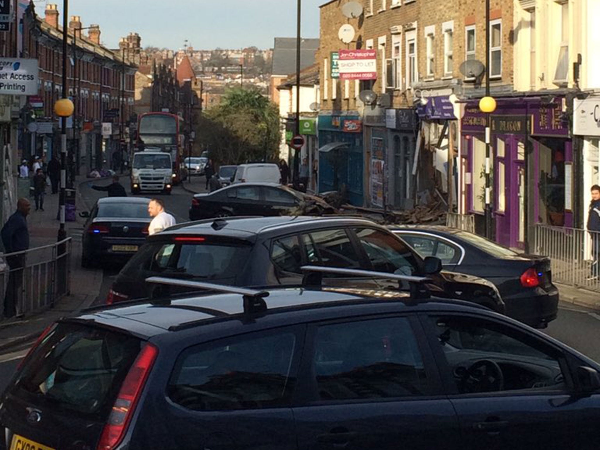 The car crashed into a mobile phone shop after a police chase