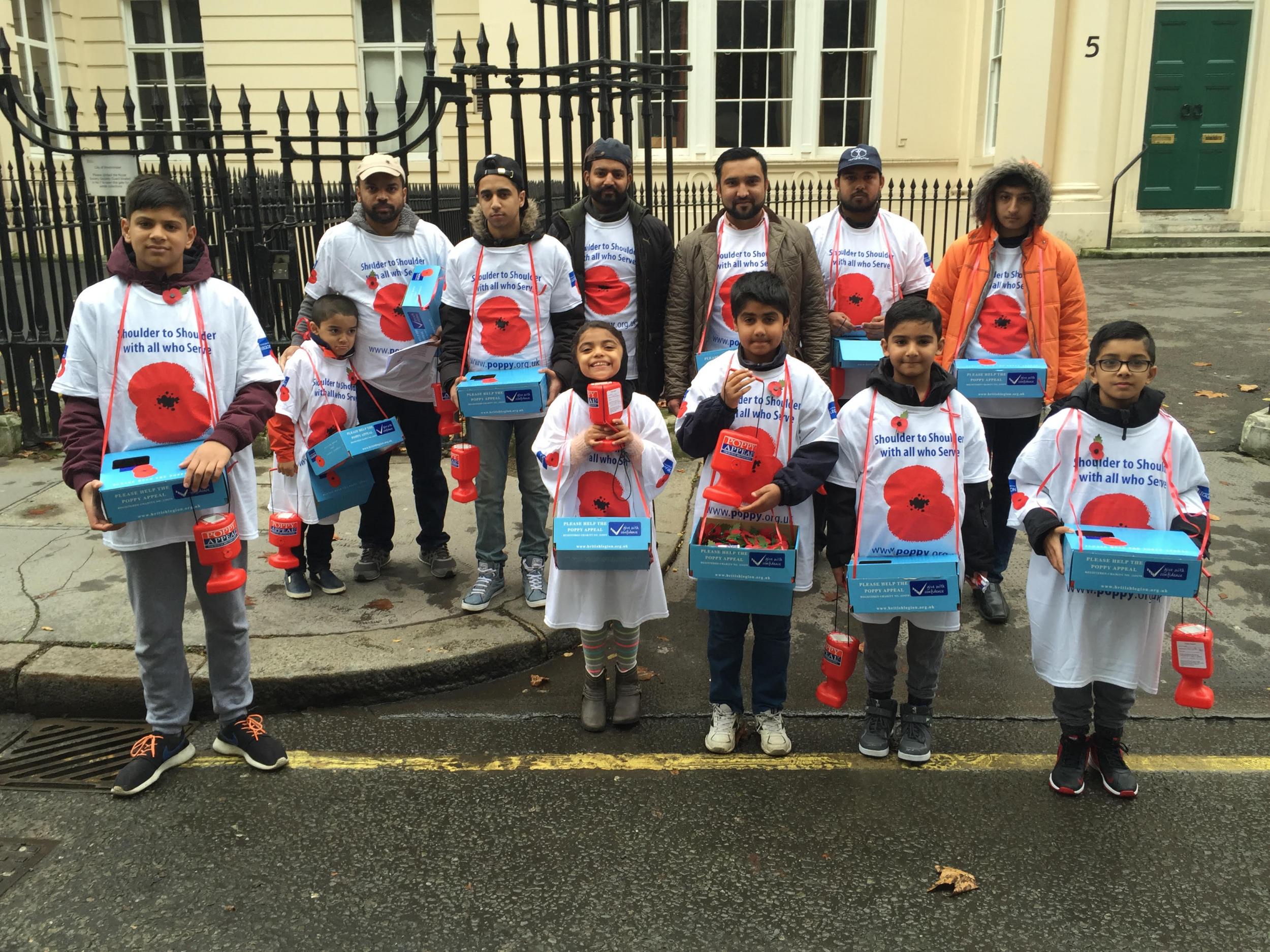 Sadiya (centre) collecting money for the Poppy Appeal