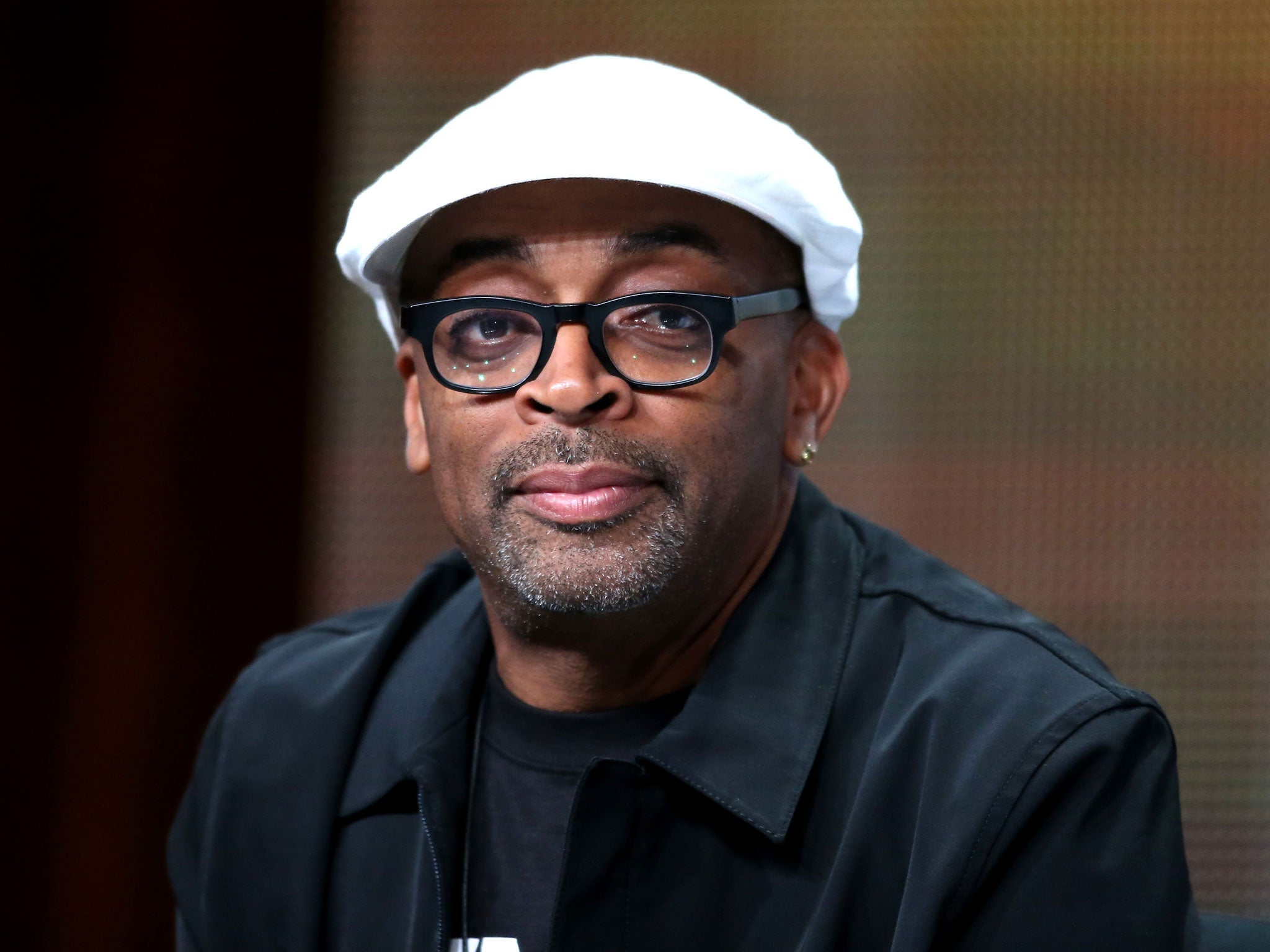 Spike Lee has announced he will not attend the main Oscar ceremony in February