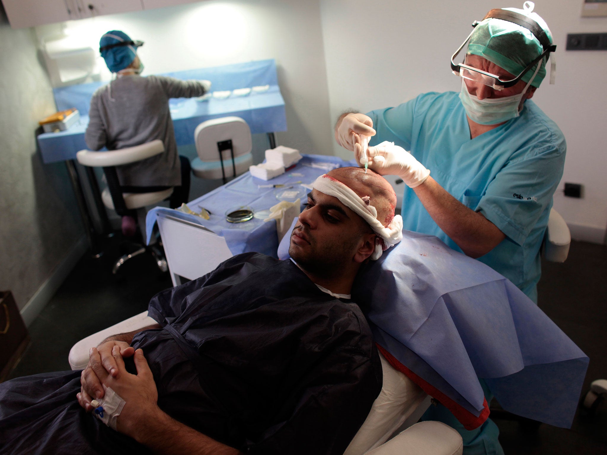 Fahad Ali, a 27-yearold medical tourist from Britain, is prepared for a hair transplant in Istanbul