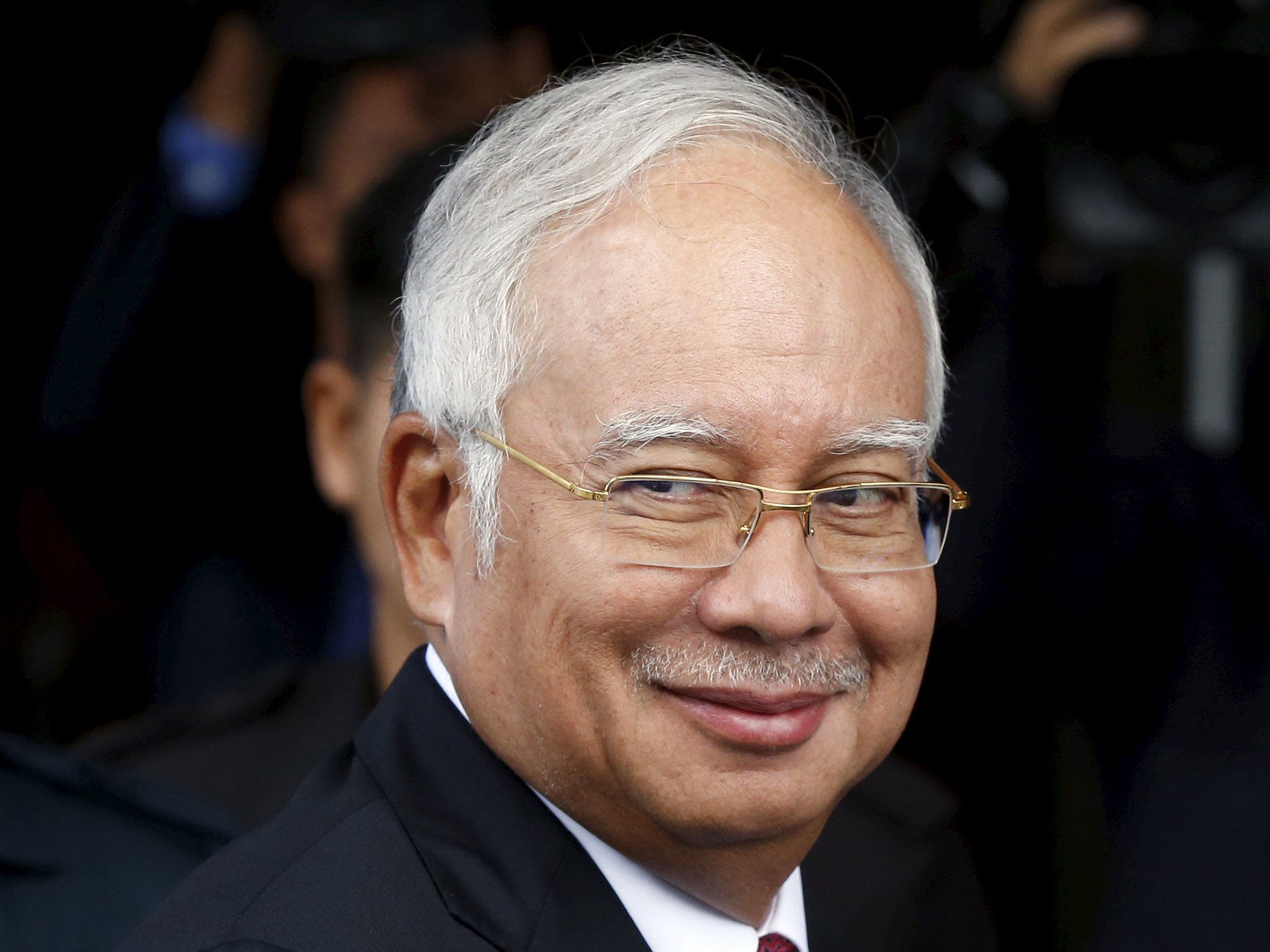 Malaysia's Prime Minister Najib Razak leaves parliament in Kuala Lumpur