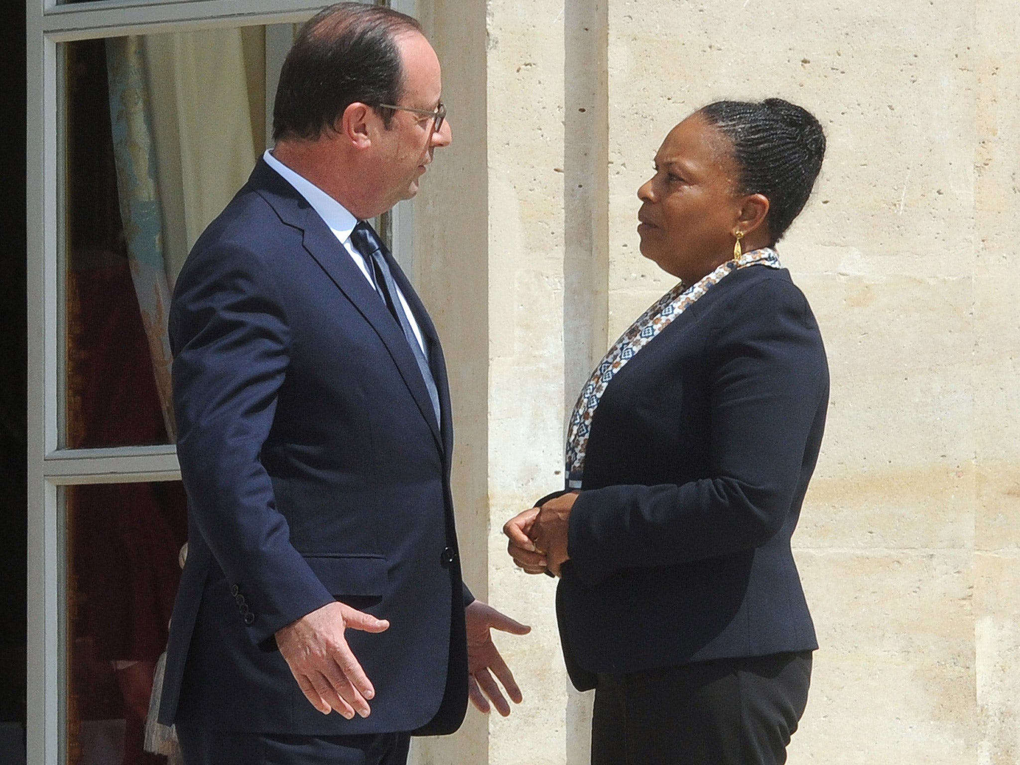 Christiane Taubira with President Hollande in 2014 (AFP/Getty)