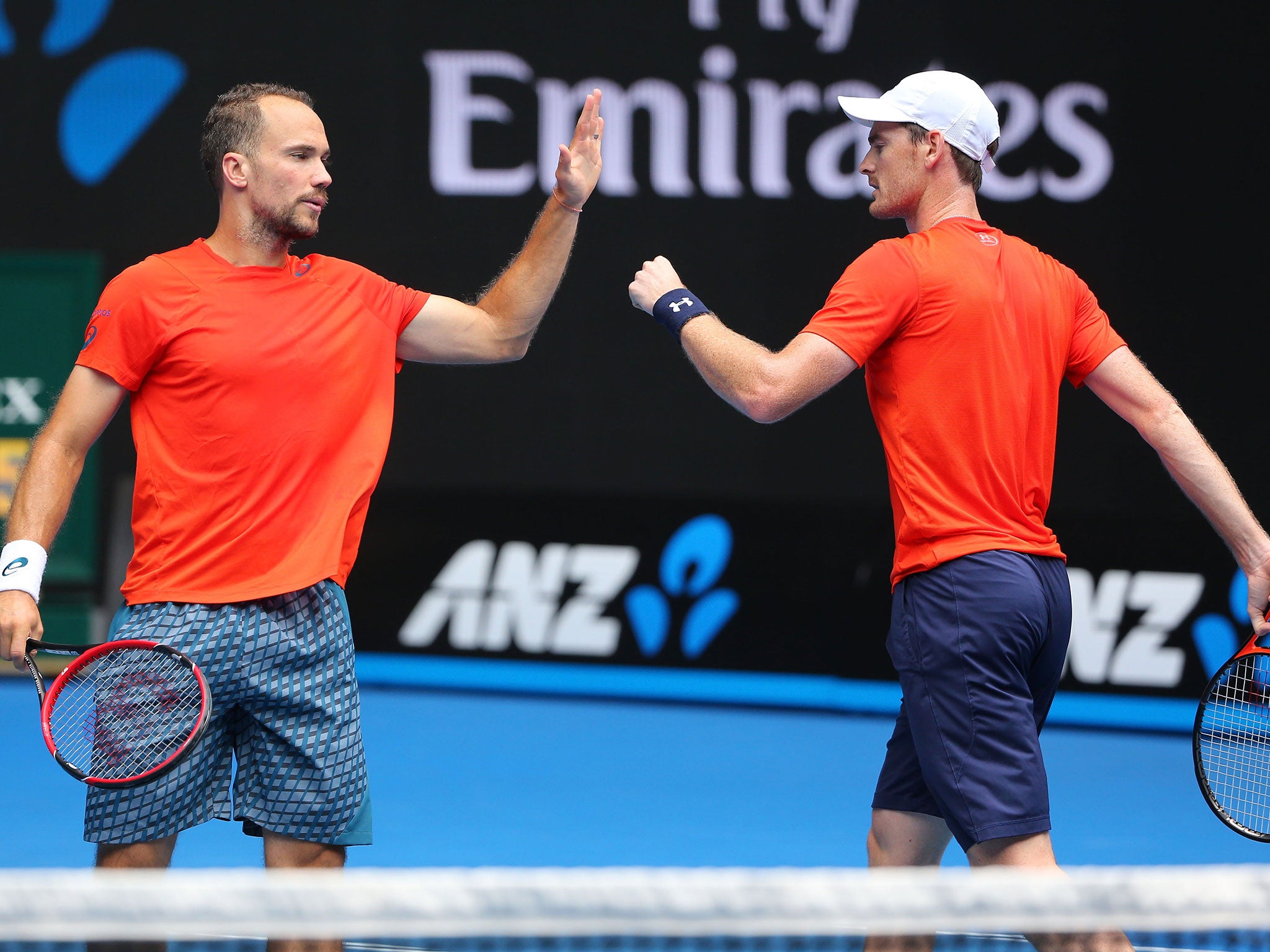 Bruno Soares of Brazil and Jamie Murray of Great Britain celebrate a point in their doubles semi finals win