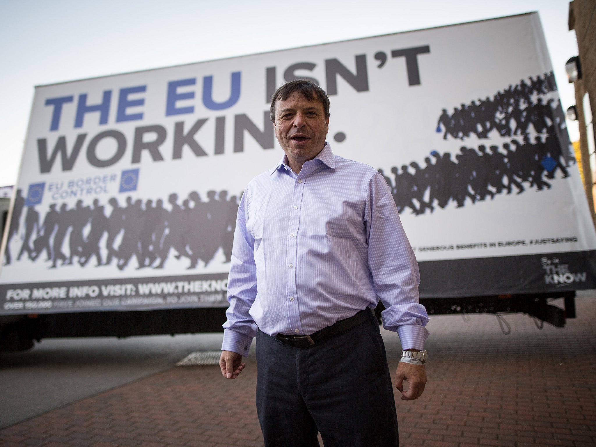 Aaron Banks in front of an ad trailer with 'The EU isn't working' UKIP Conference, Doncaster, Britain