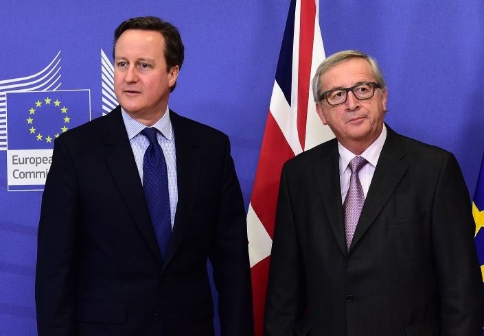 British Prime Minister David Cameron (L) is welcomed by European Commission president Jean-Claude Juncker prior to a meeting at the European Commission in Brussels.