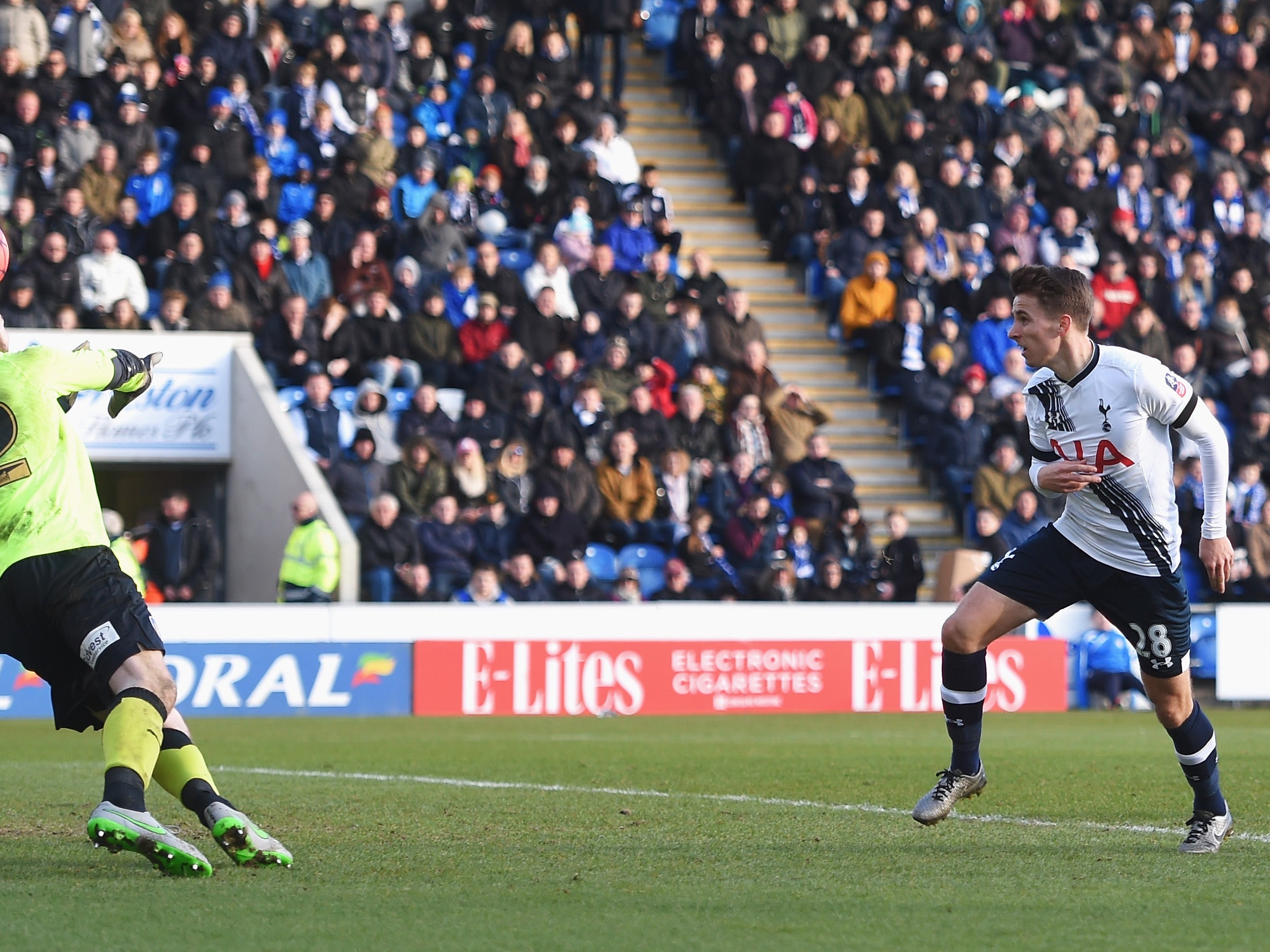 Carroll nods the ball towards goal