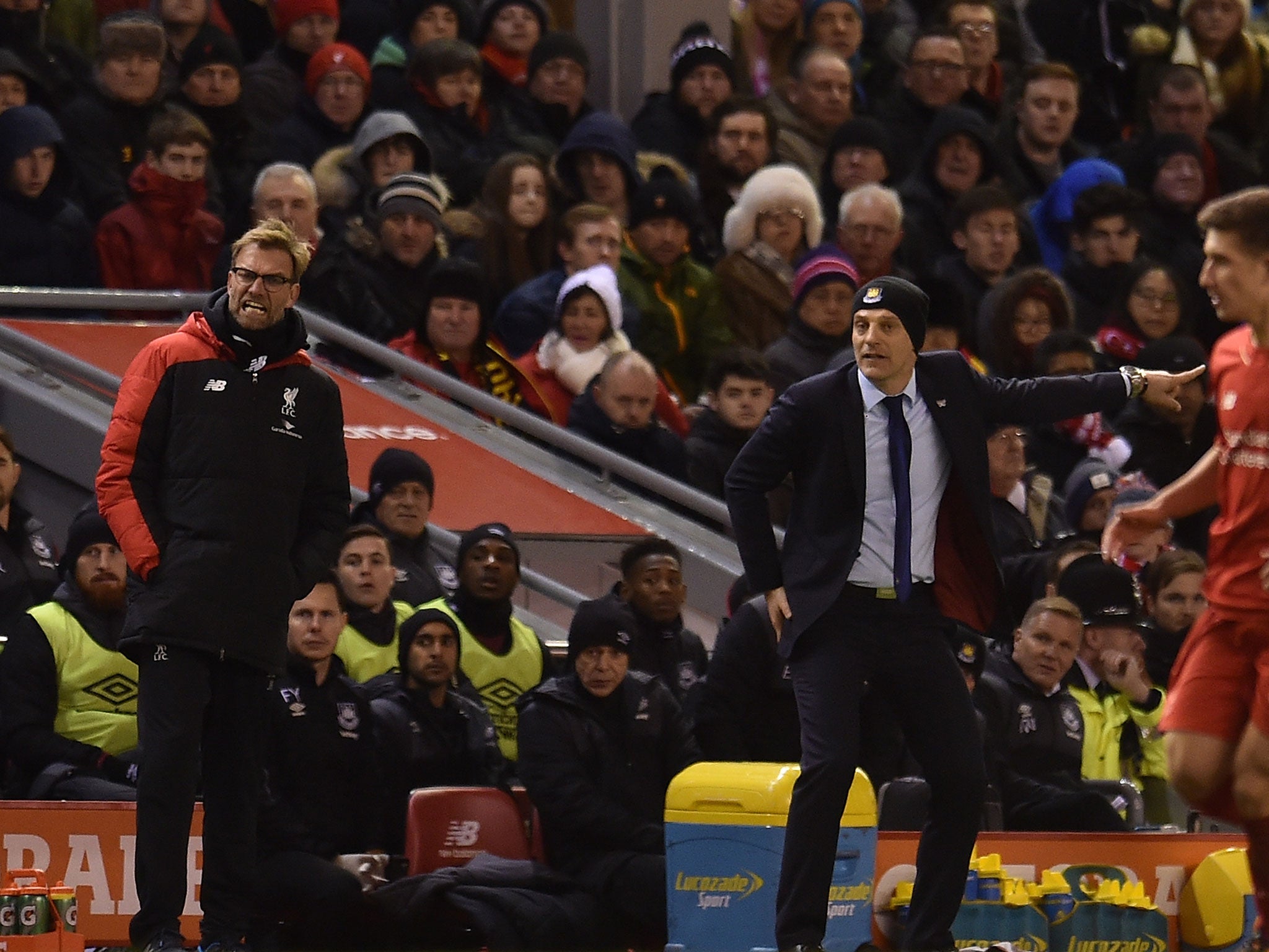 Jurgen Klopp and Slaven Bilić address their sides during their fourth round cup match