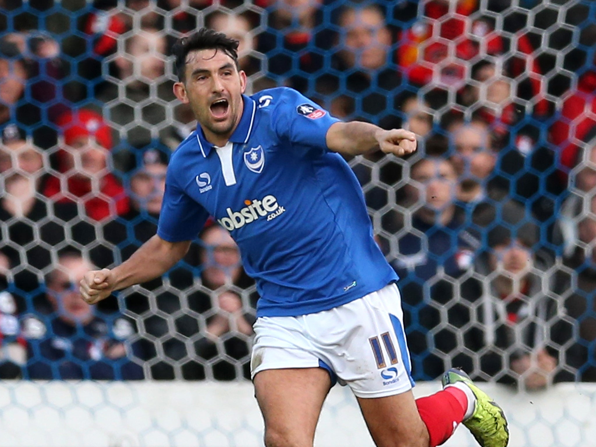 Gary Roberts celebrates opening the scoring