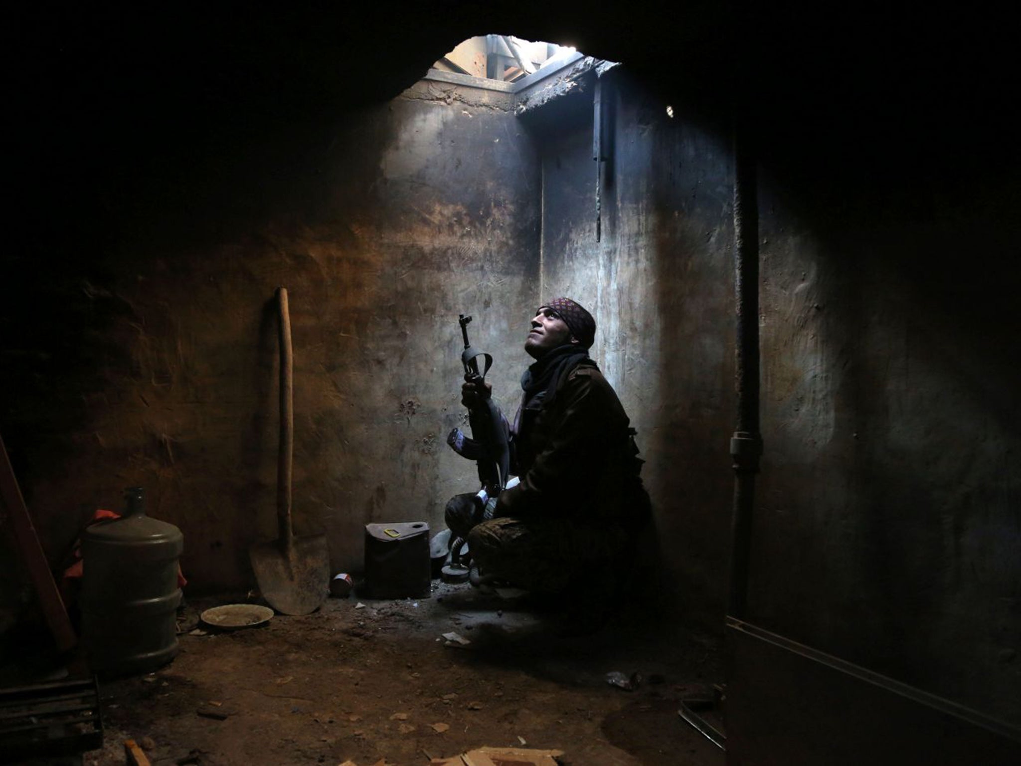 An anti-Assad fighter, in rebel-held Arbeen, near Damascus