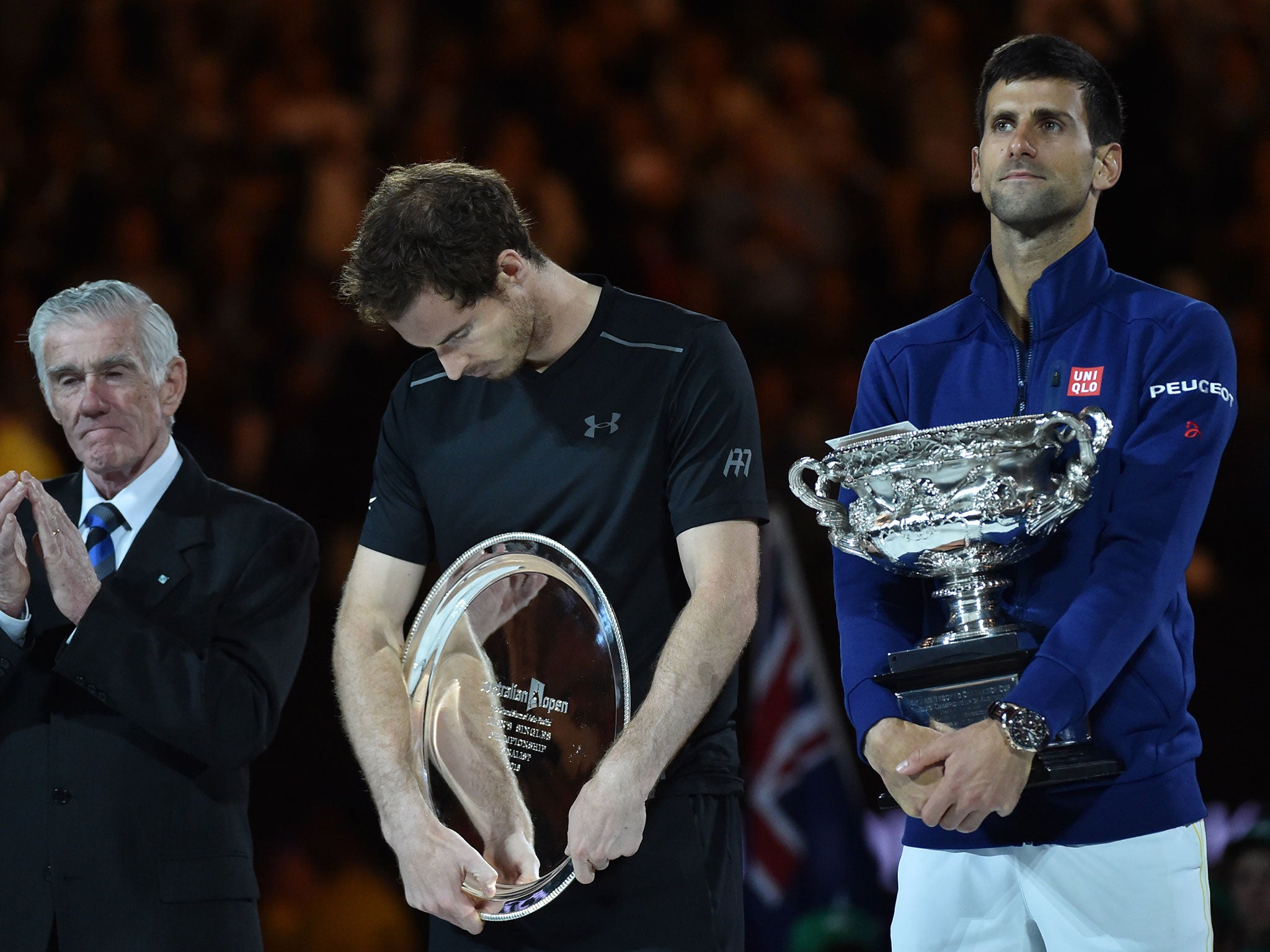 Andy Murray stands next to Novak Djokovic after the Australian Open final