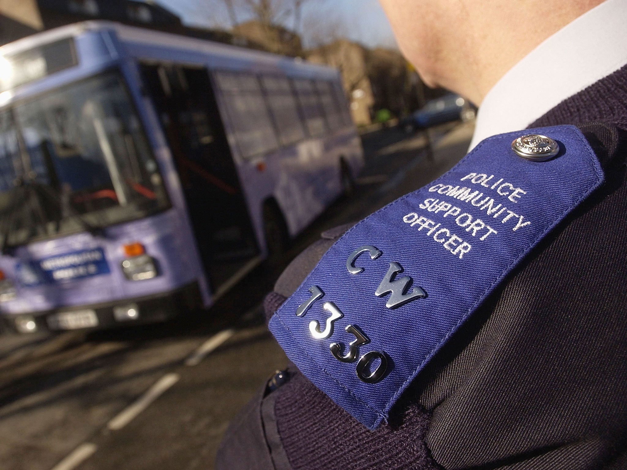 A uniformed police community support officer