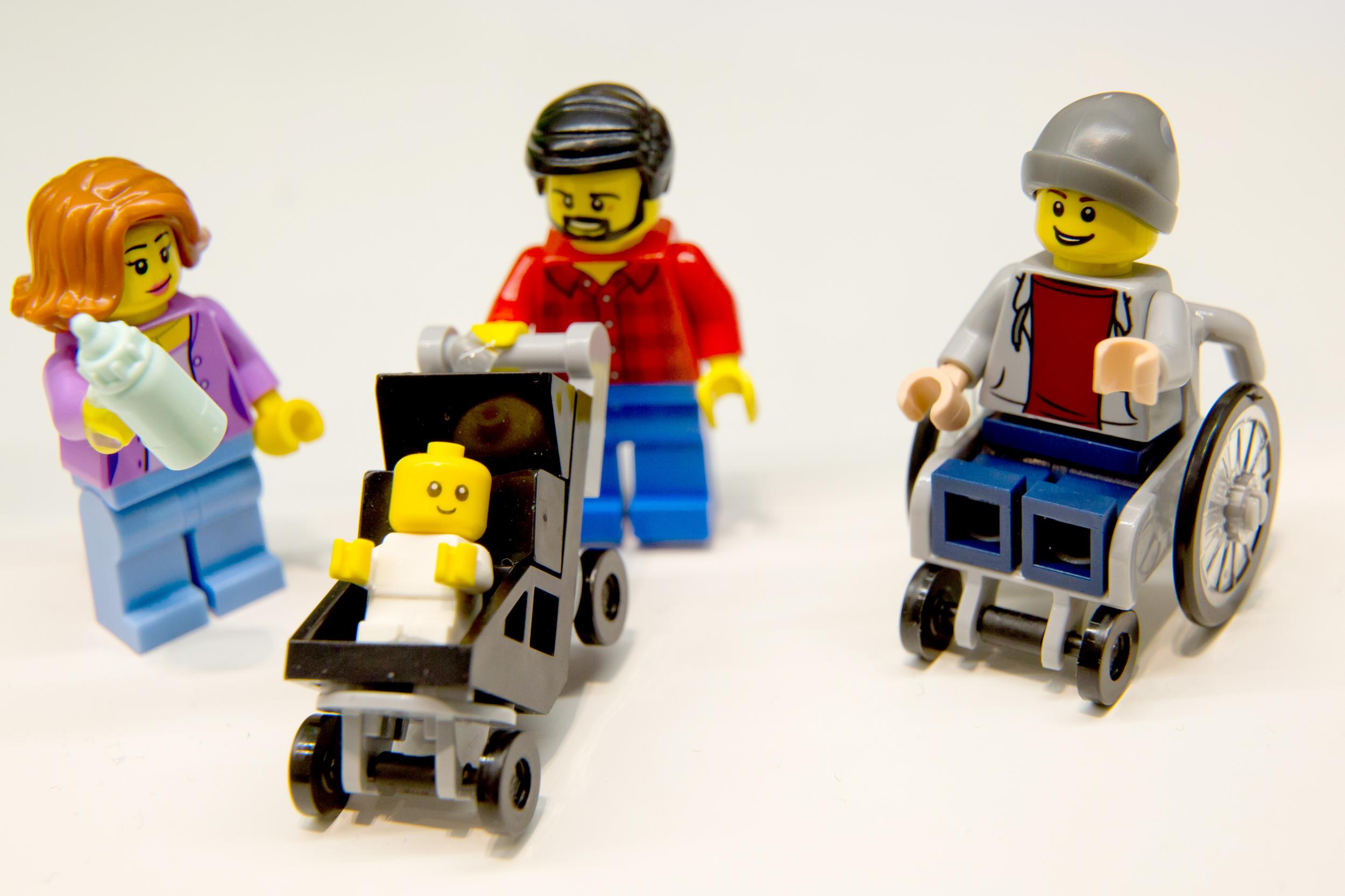 Lego figurines, including one in a wheelchair are pictured at the Lego booth