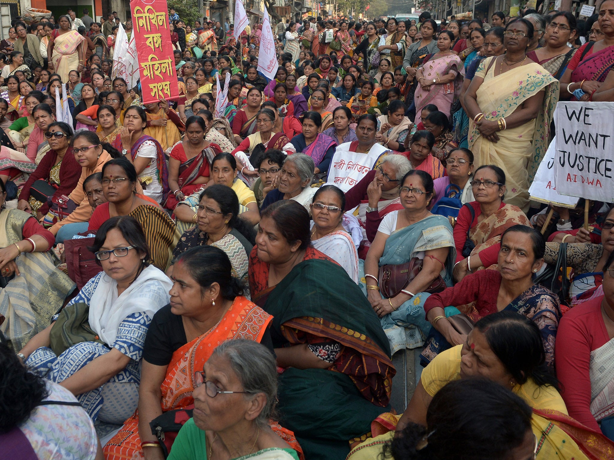 Women in Kolkata stage peaceful protest outside the courthouse where three men are sentenced to death for gang-raping and murdering a 20-year-old woman