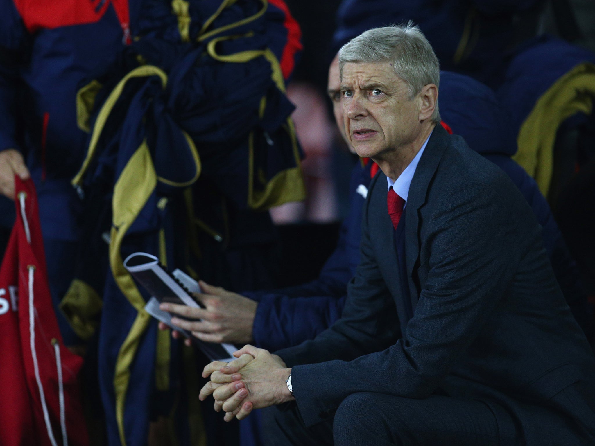 Arsene Wenger looks on in dismay as Arsenal go down 4-0 to Southampton at St Mary's Stadium on Boxing Day