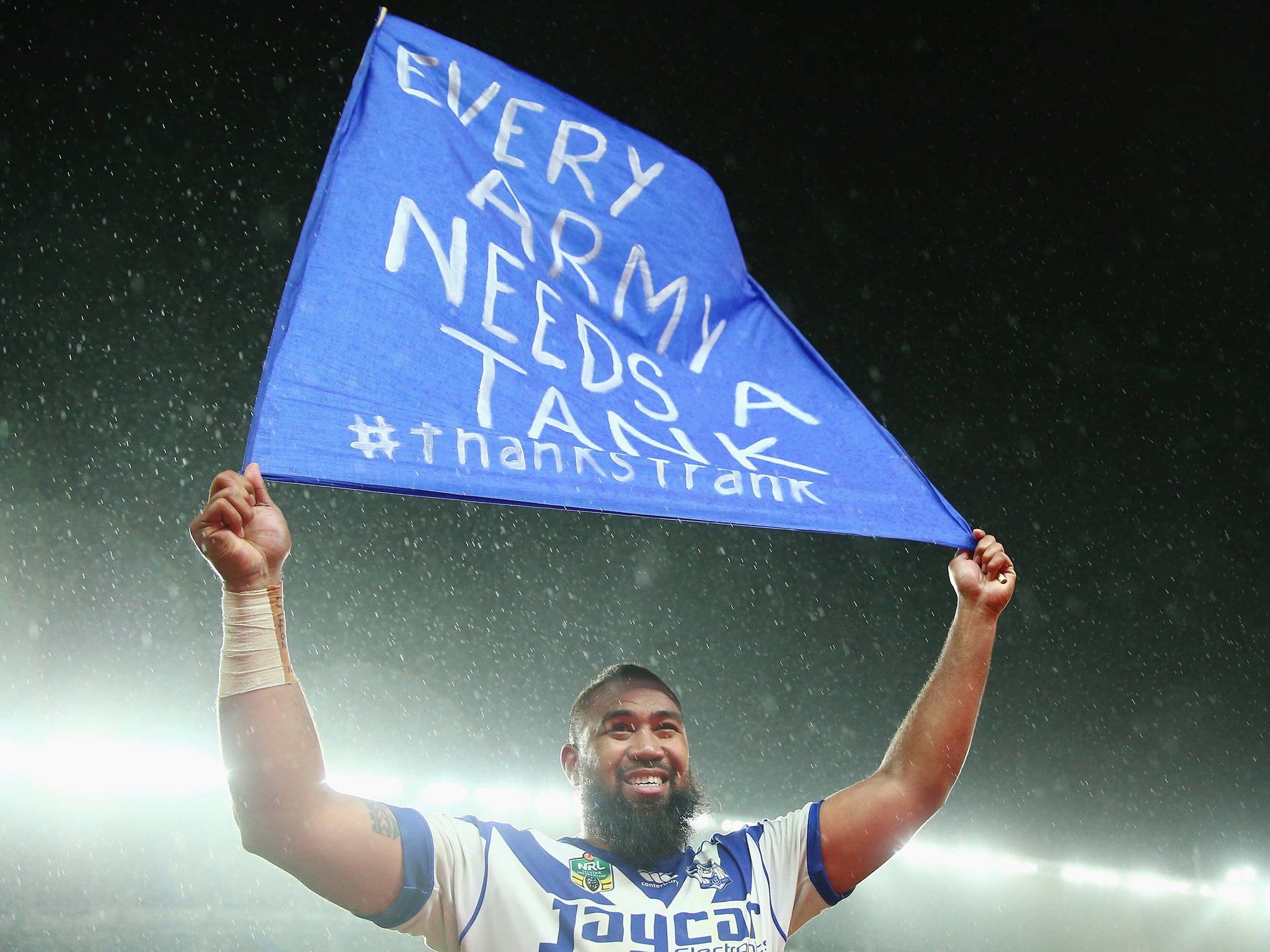 Frank Pritchard holds up a sign to the crowd after his final match for the Canterbury Bulldogs last September