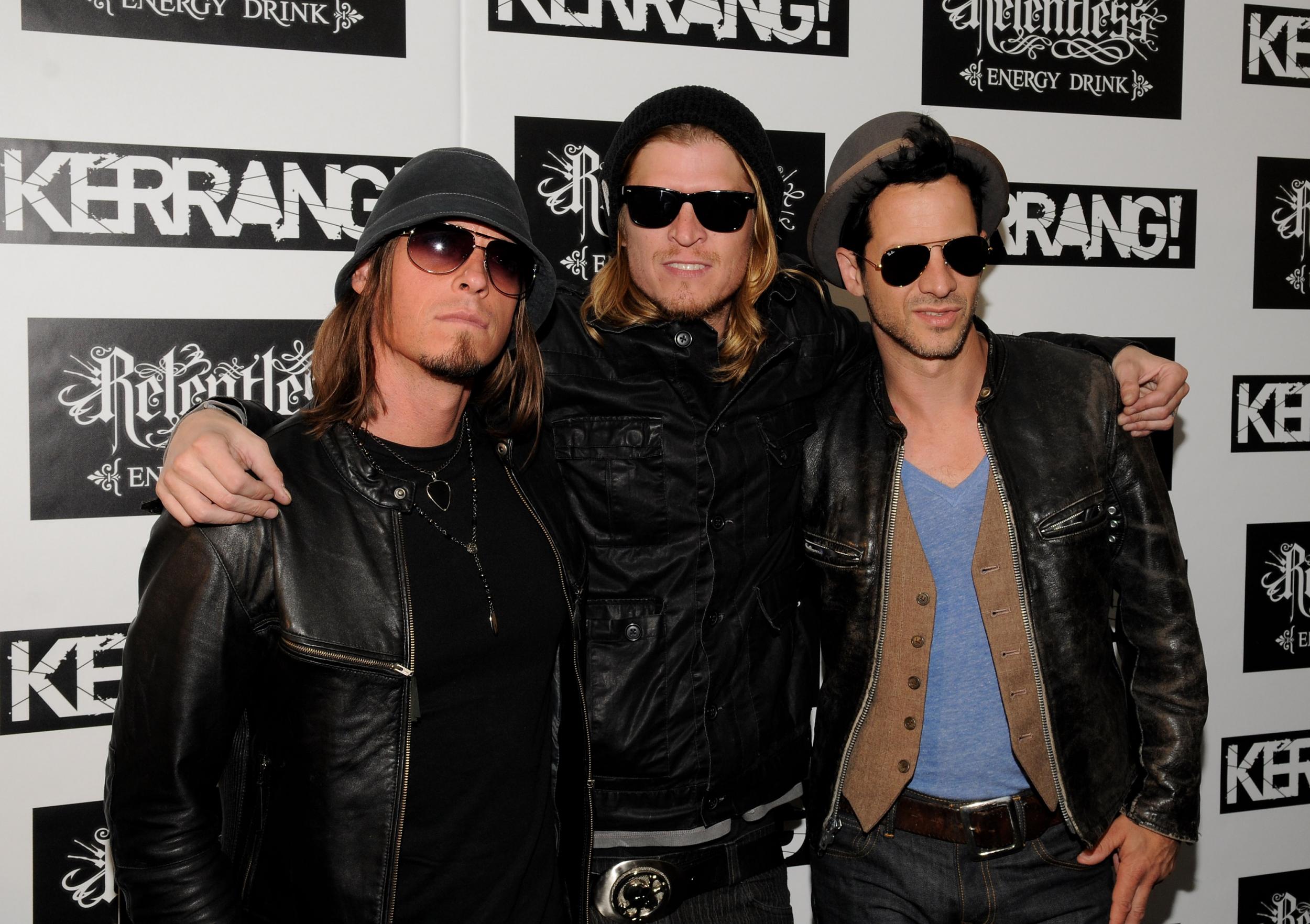 Wes Scantlin (middle) with his Puddle of Mudd band members