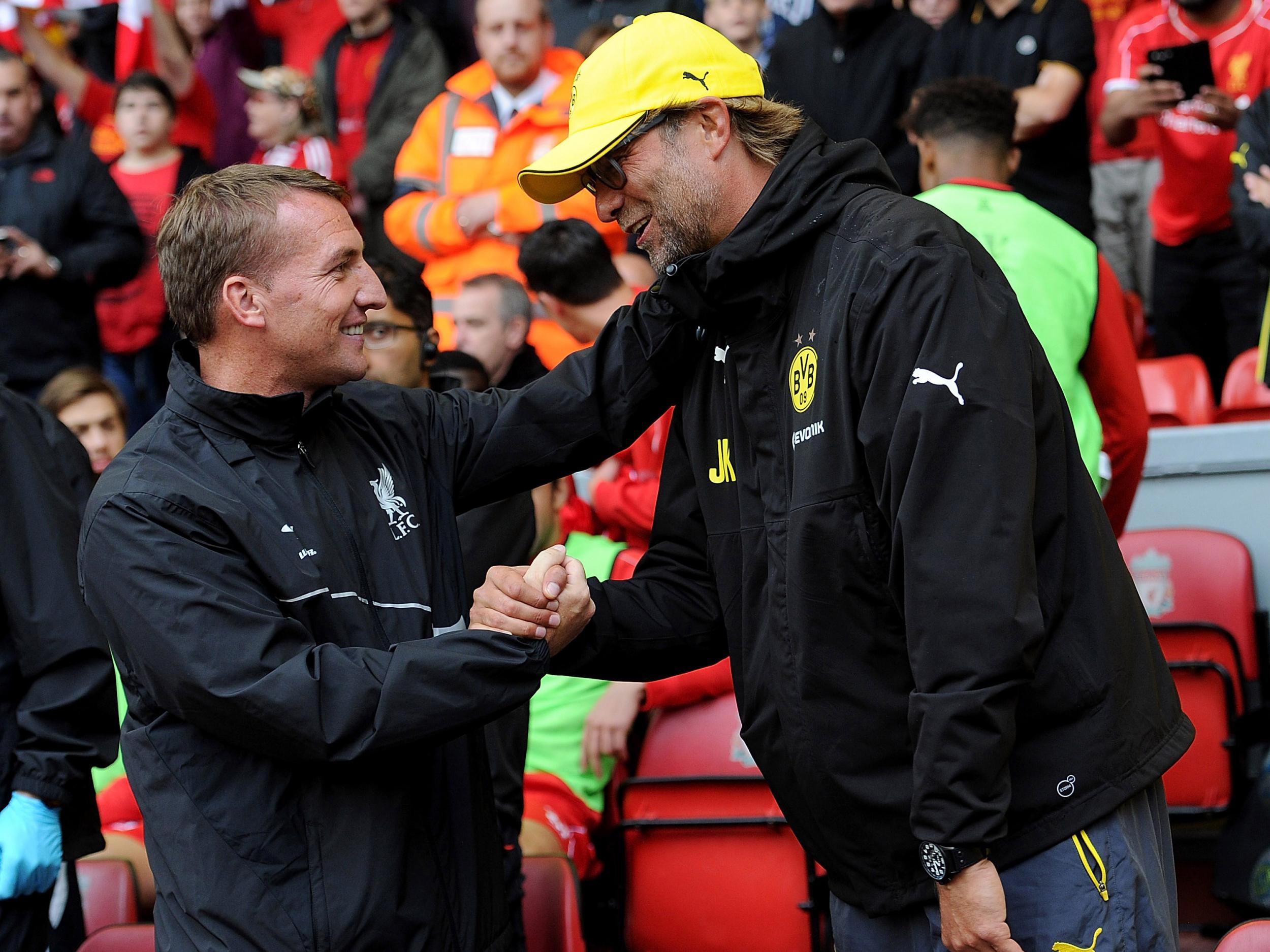 Brendan Rodgers and Jurgen Klopp embrace