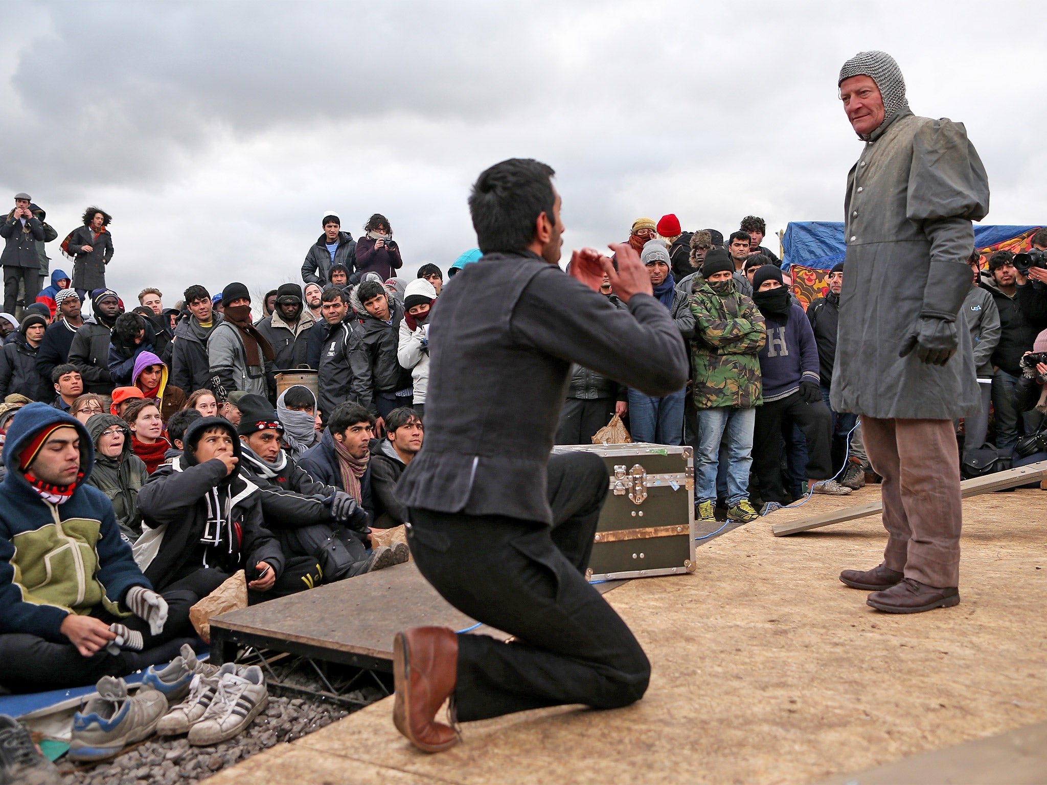 &#13;
Actors from the Globe performing in Calais. The tour is aiming to perform Hamlet in every country on earth over two years (Getty)&#13;