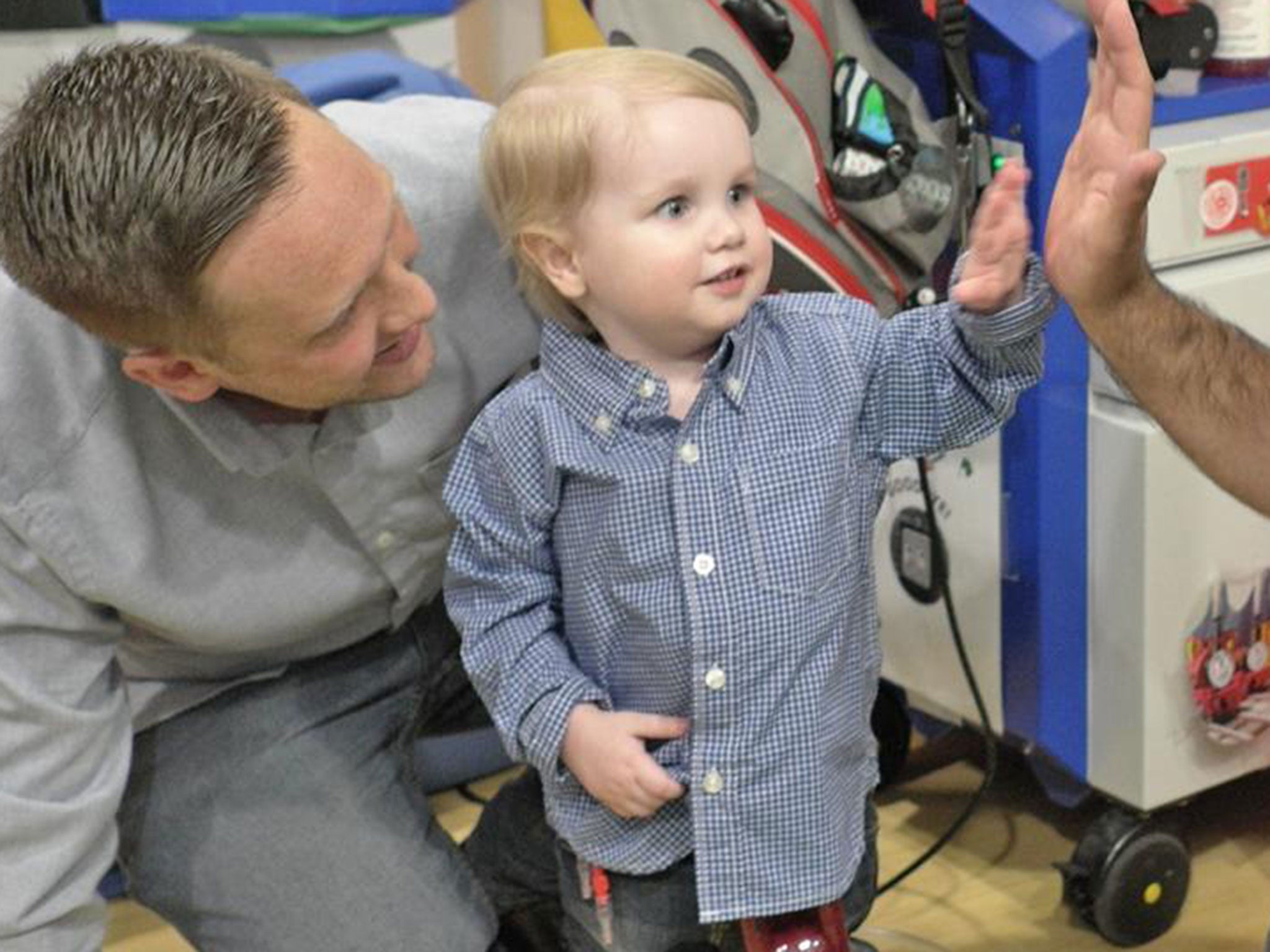 Two-year-old Elliott Livingstone and his dad Adrian