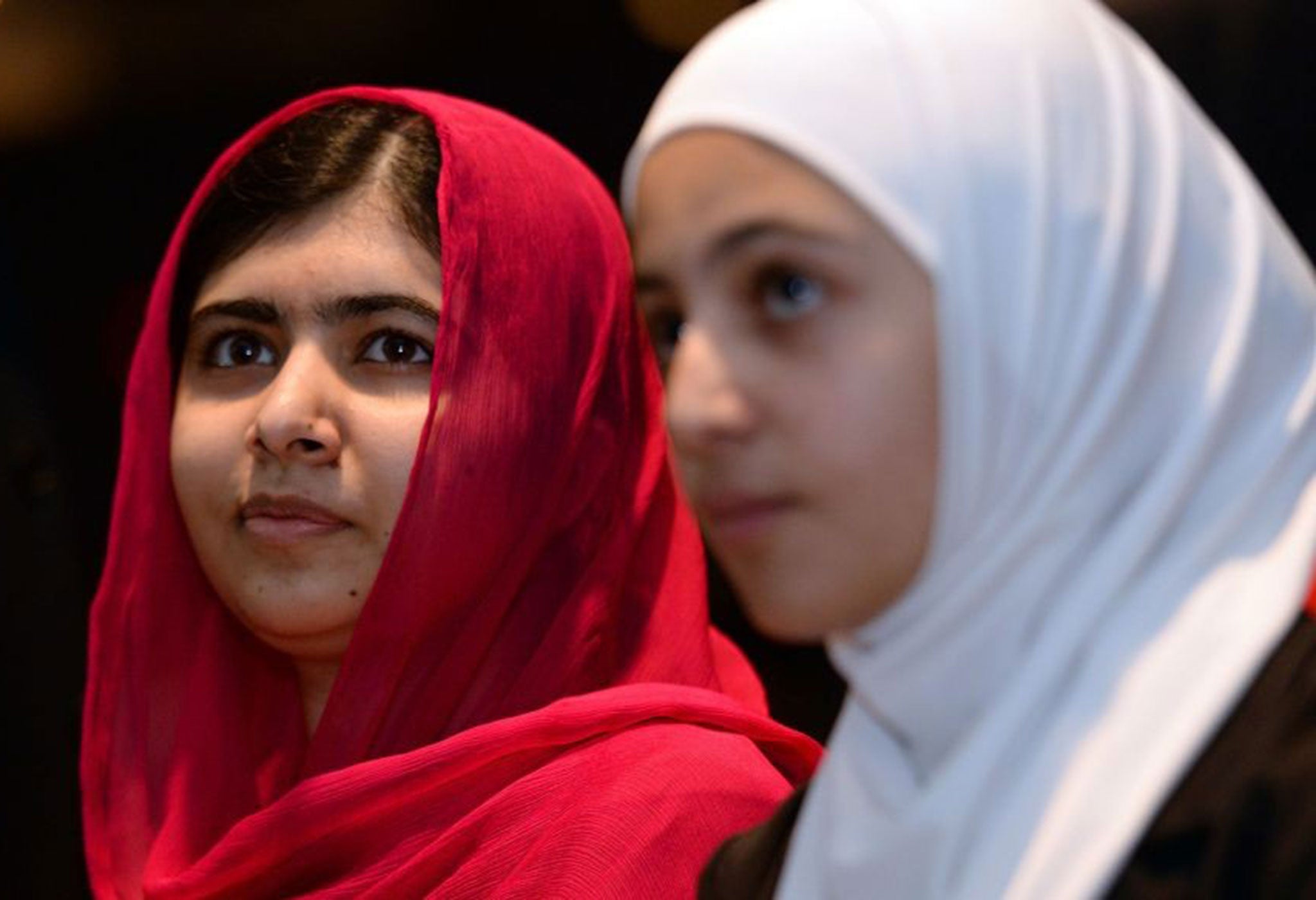 Nobel Peace Prize winner Malala Yousafzai (left) and 17-year-old Syrian refugee Muzoon Almellehan at the 'Supporting Syria and the Region' conference in London on 4 FEbruary