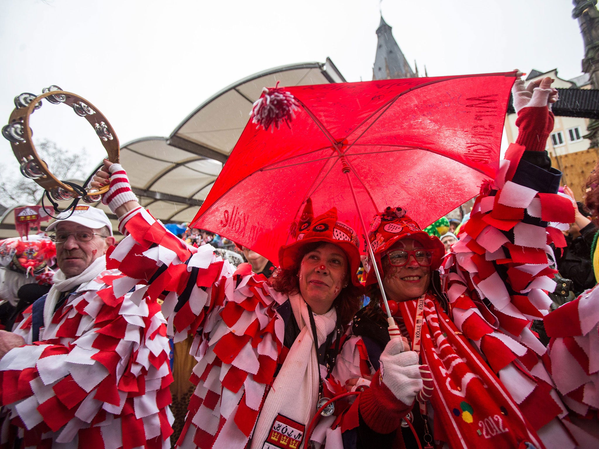 People wearing costumes celebrate carnival in Cologne, Germany. The carnival peak season has begun with increased security measures in place following a string of New Year's Eve attacks when scores of women reported to have been sexually harassed and robbed at the city's main train station