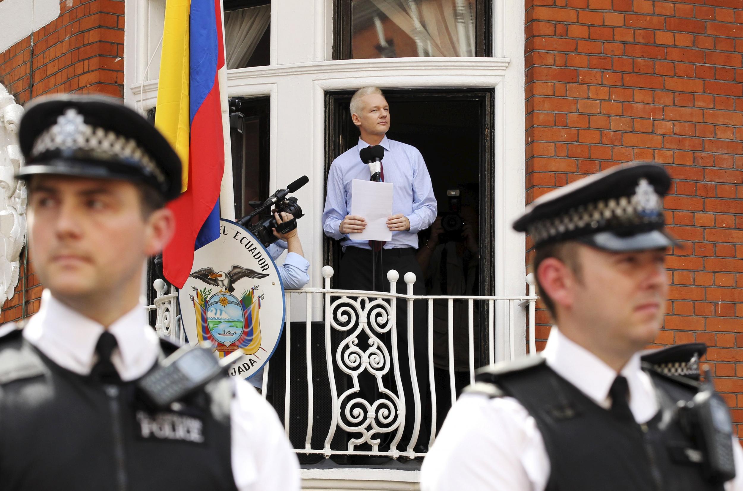 Assange speaking to the media outside the Ecuador embassy in 2012