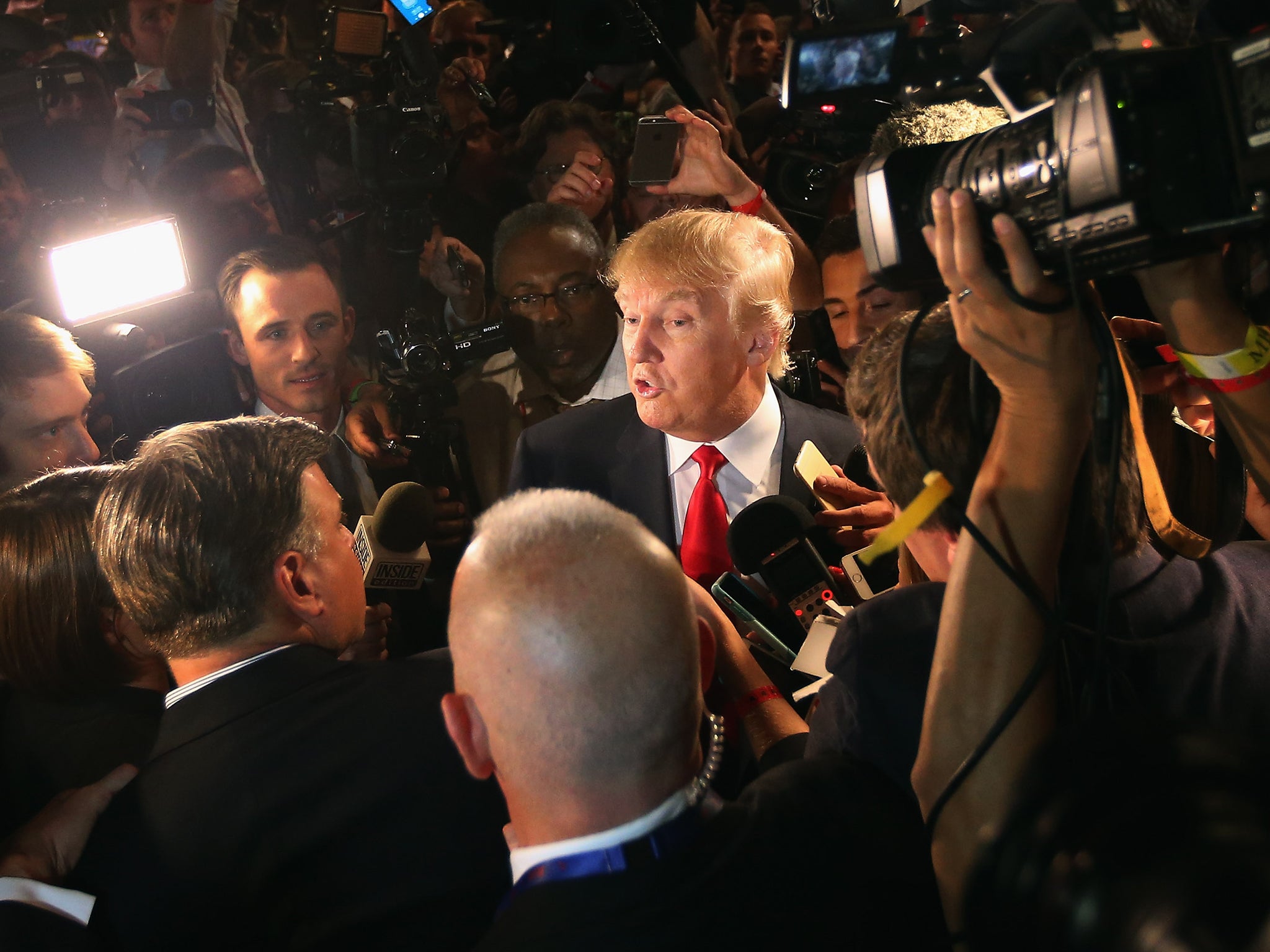 Trump talks to reporters after apresidential debate in Cleveland, Ohio