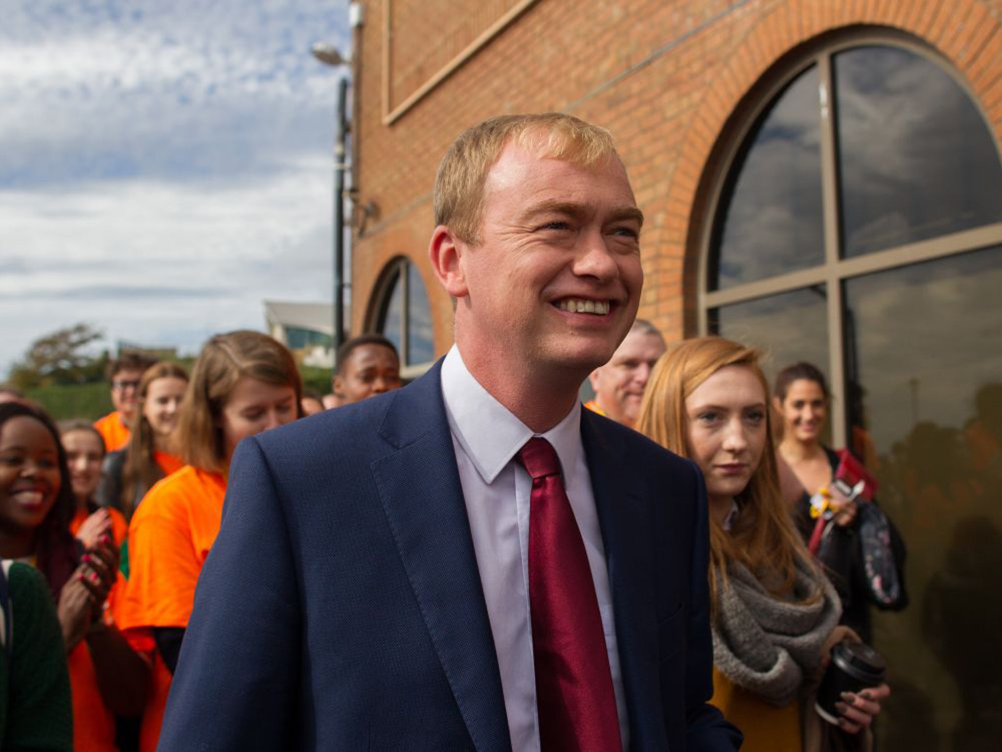 Leader Tim Farron arriving at his conference last September