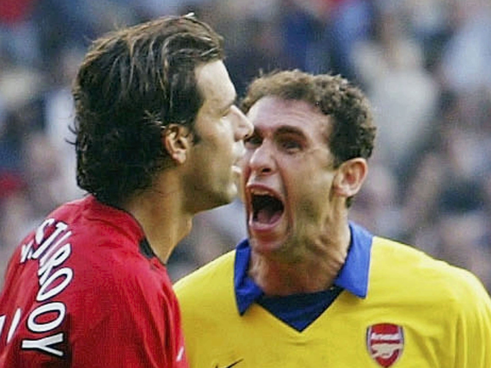 Ruud van Nistelrooy and Martin Keown in September 2003