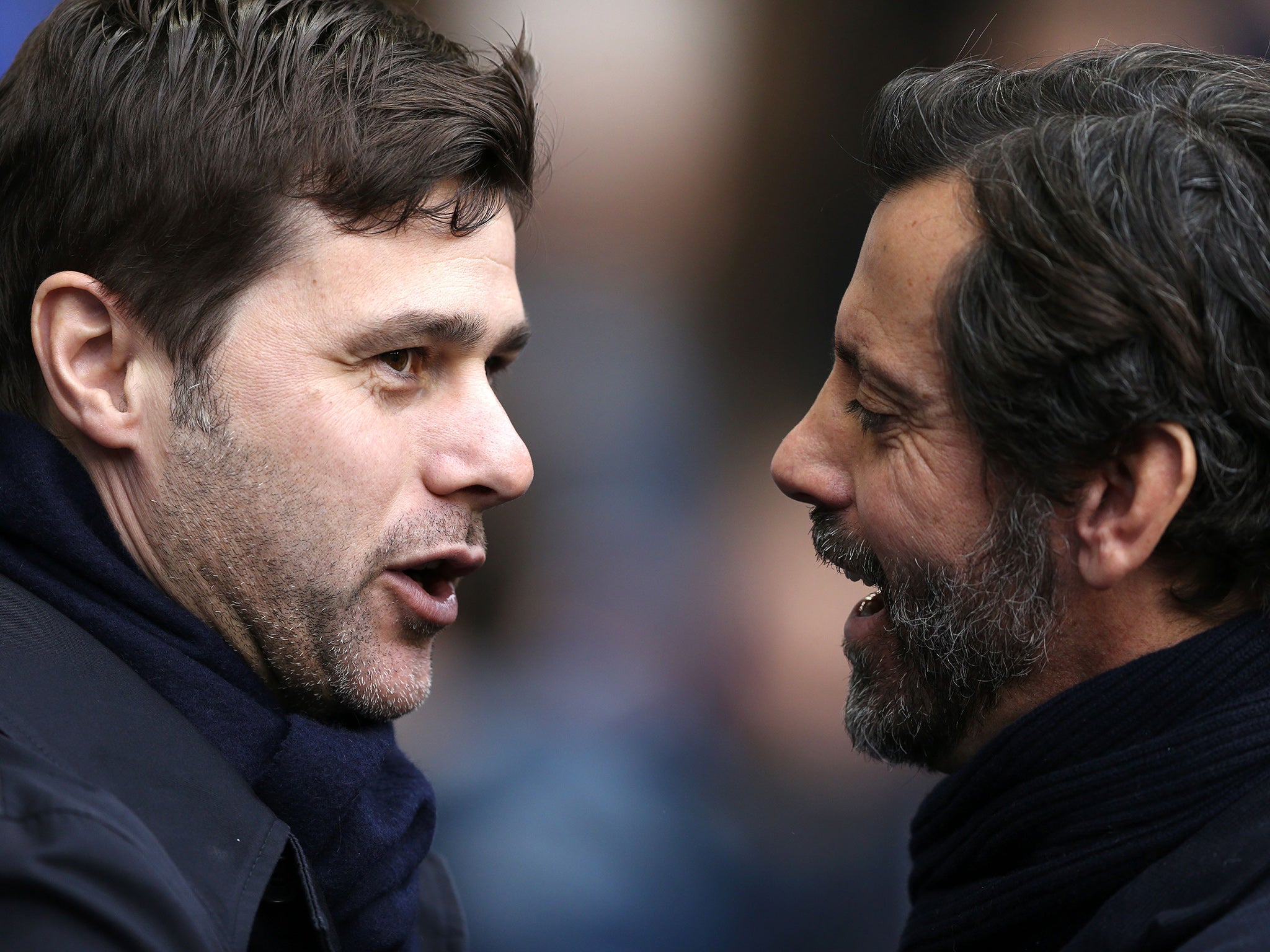 Mauricio Pochettino and Quique Sanchez Flores share a word