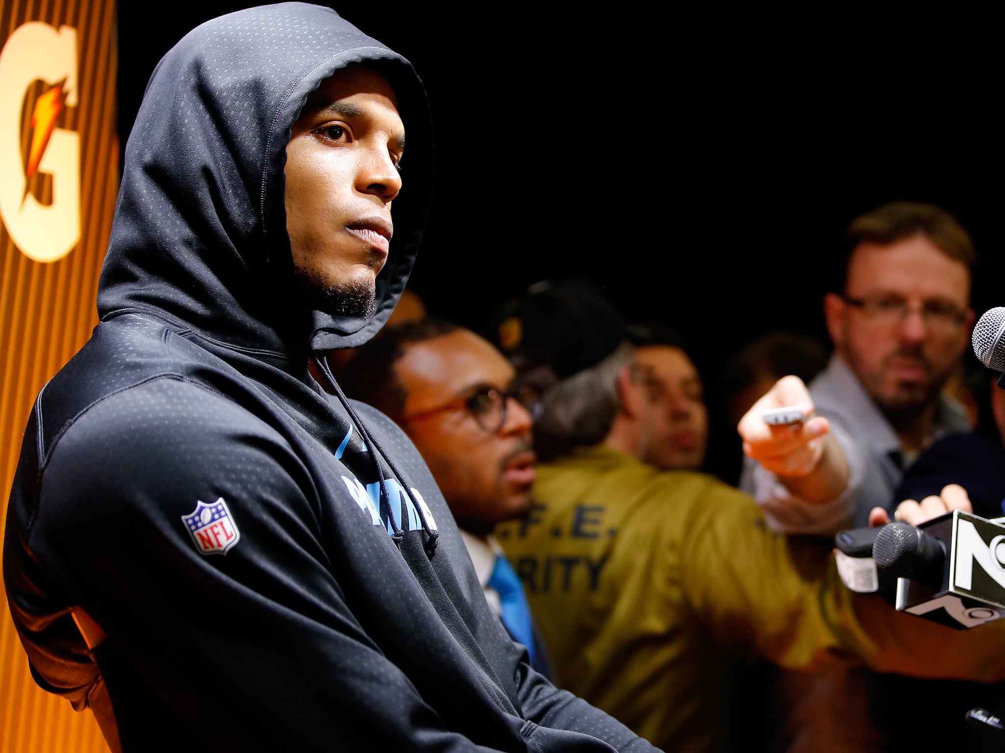 Cam Newton meets the press after Carolina Panthers' 24-10 defeat to Denver Broncos in Super Bowl 50