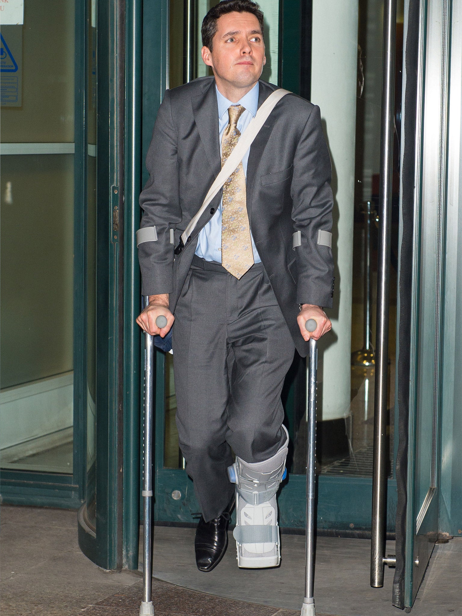 Huw Merriman leaving court in Poplar, east London