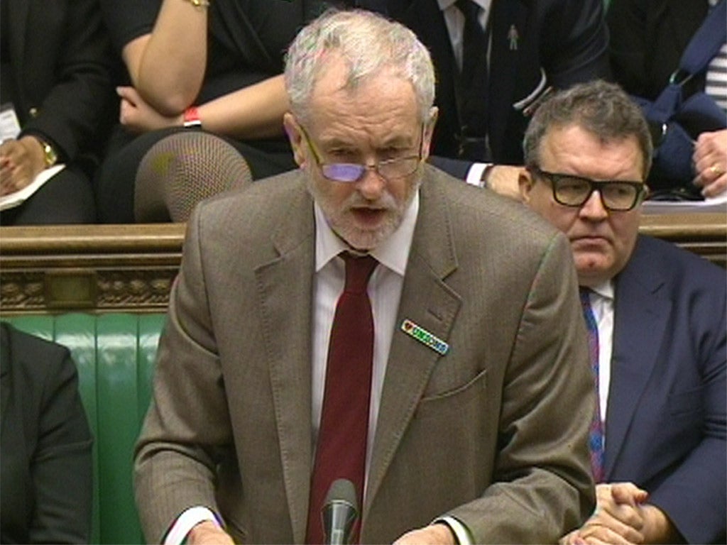 Jeremy Corbyn, wearing a badge in support of trade unions, at PMQs