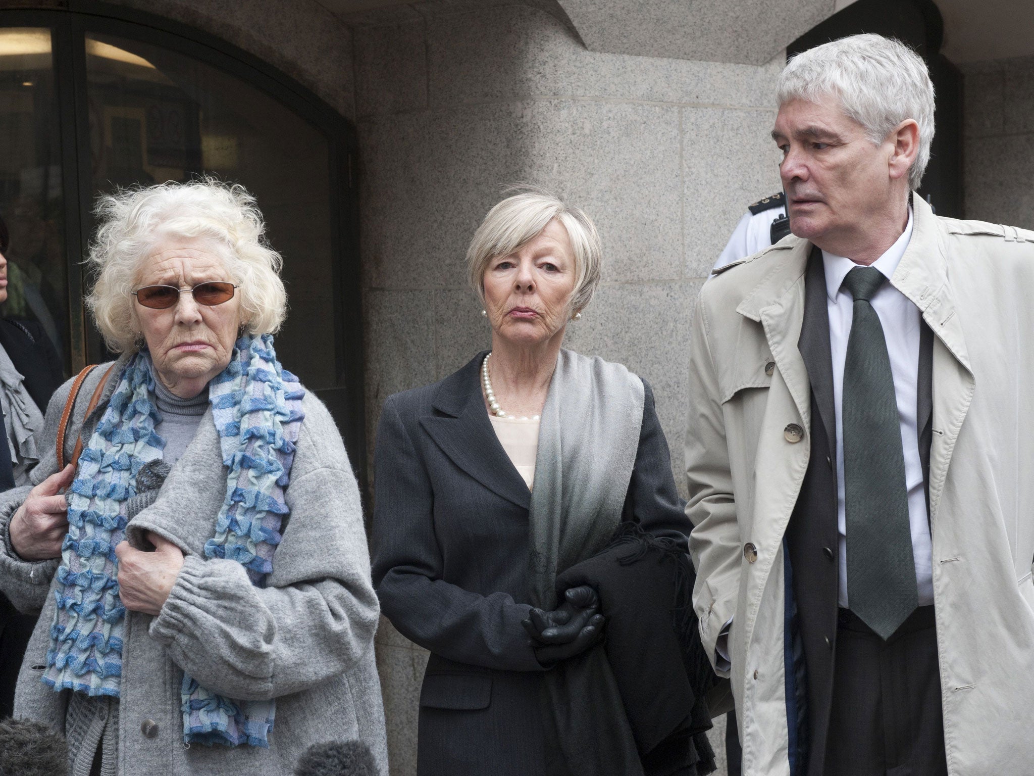 Daniel Morgan's mother Isobel Hulsmann, widow Iris Morgan and brother Alastair outside court in 2011 following the collapse of the trial for Morgan's murder (Rex)