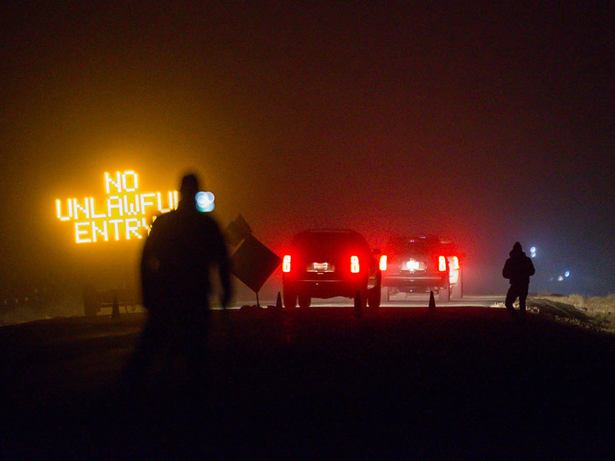 FBI agents block the road to Malheur National Wildlife Refuge